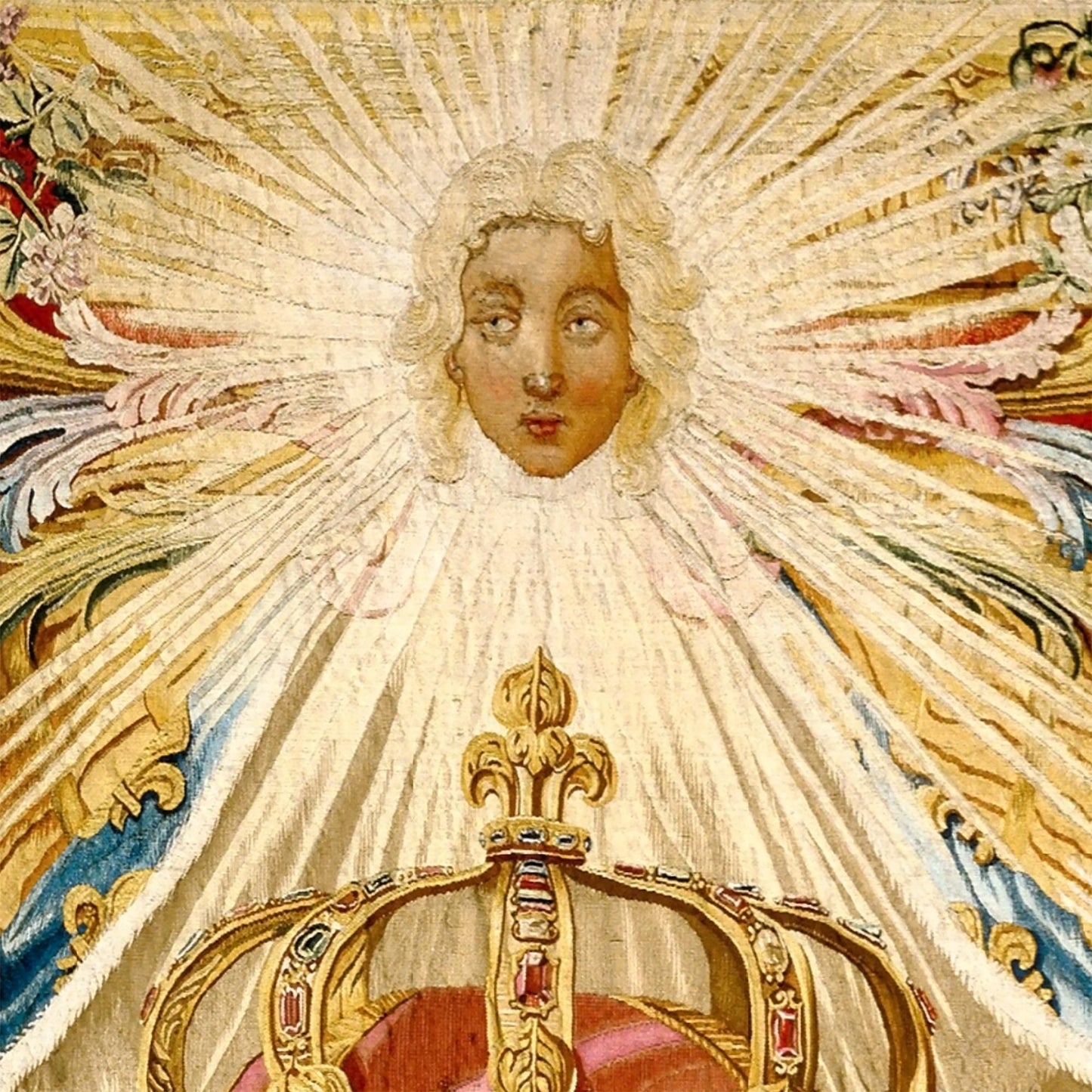 Radiant angelic figure above the crown, emitting sunbeams, from The Arms of Louis XV tapestry.