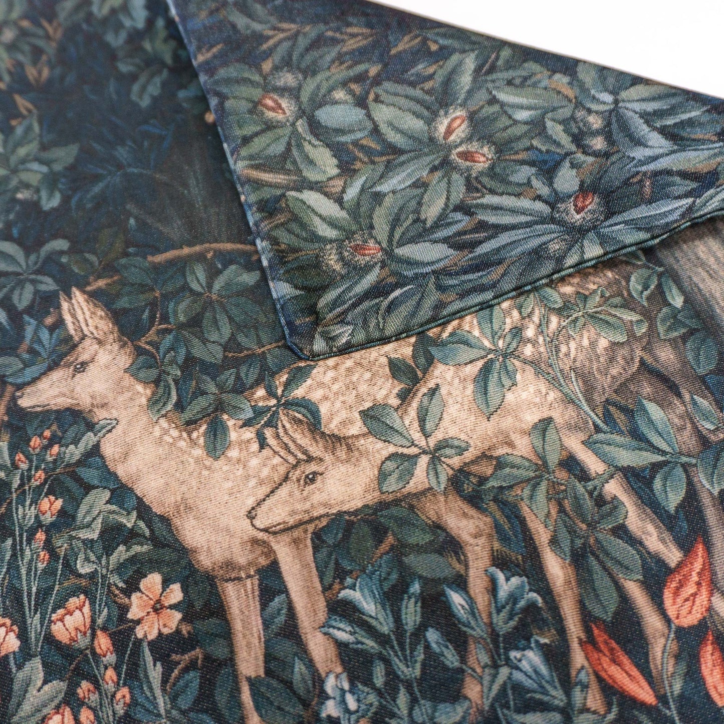 Greenery with Deers throw pillow cover folded showing the two sides printed