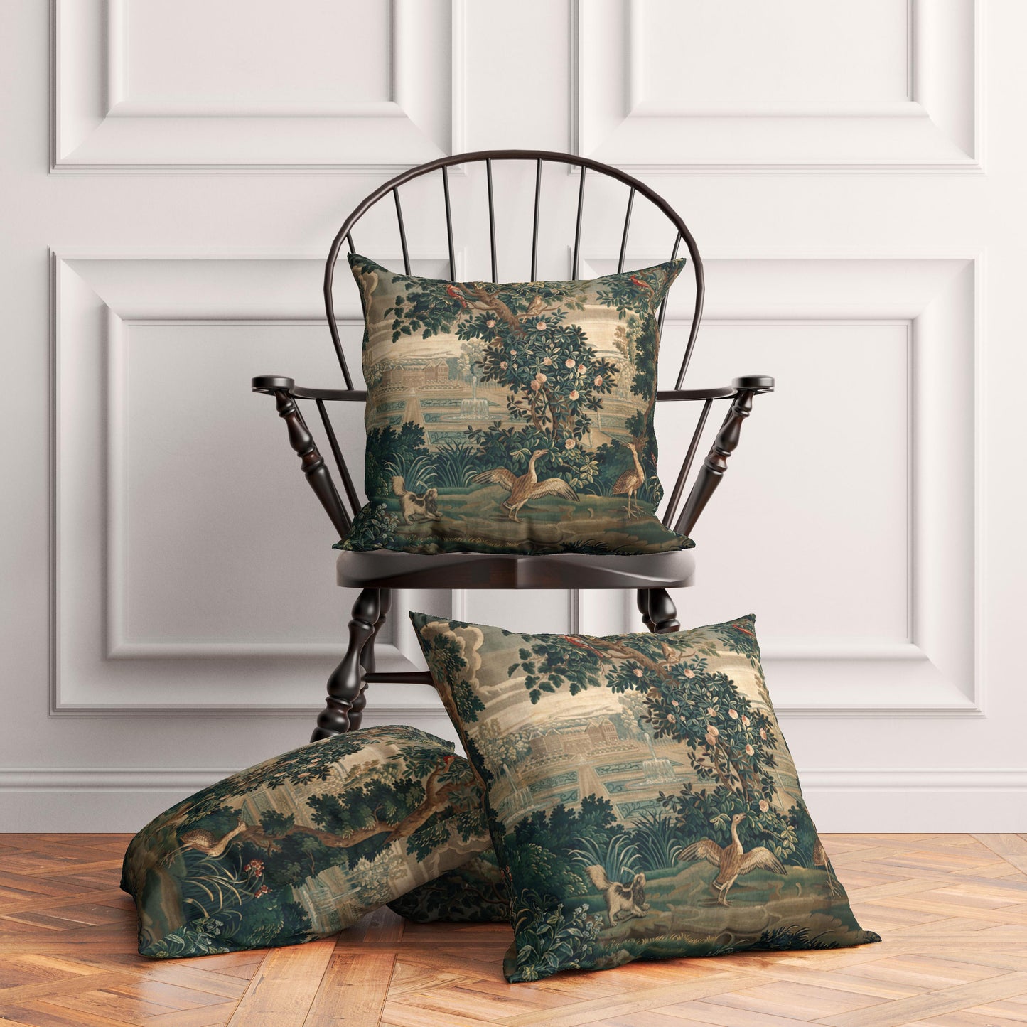 Verdure with Castle and Garden throw pillows on a vintage wooden chair and floor