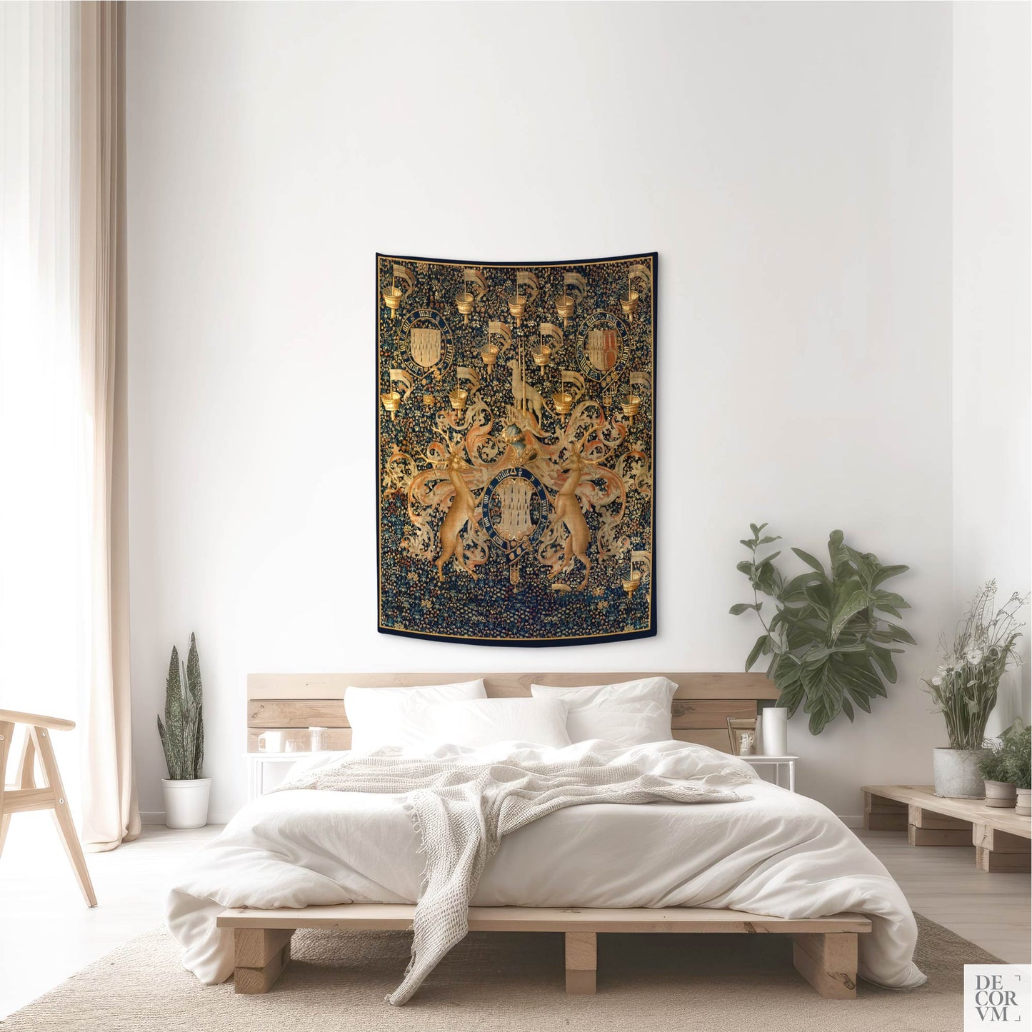 Small-scale wall tapestry with coats of arms and gold accents, showcased in a minimal Scandinavian-style bedroom.