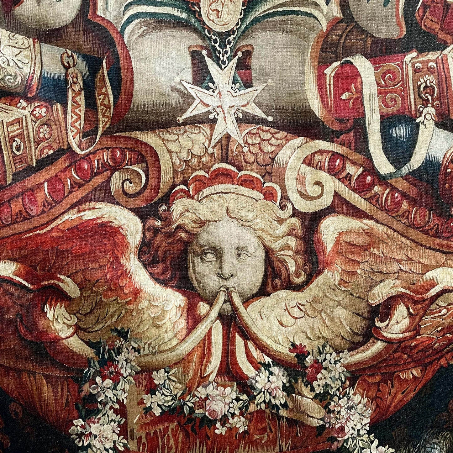 Portiere of the Chariot of Triumph Tapestry detail of a star and angel with trumpets