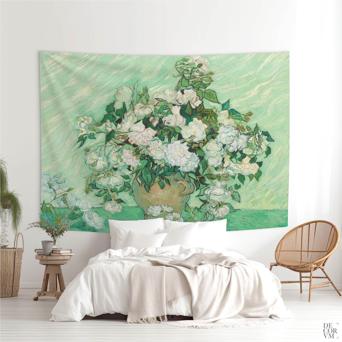 Wall tapestry with Van Gogh's “Roses” artwork hanging above a white bed in a bright, modern bedroom with natural decor.