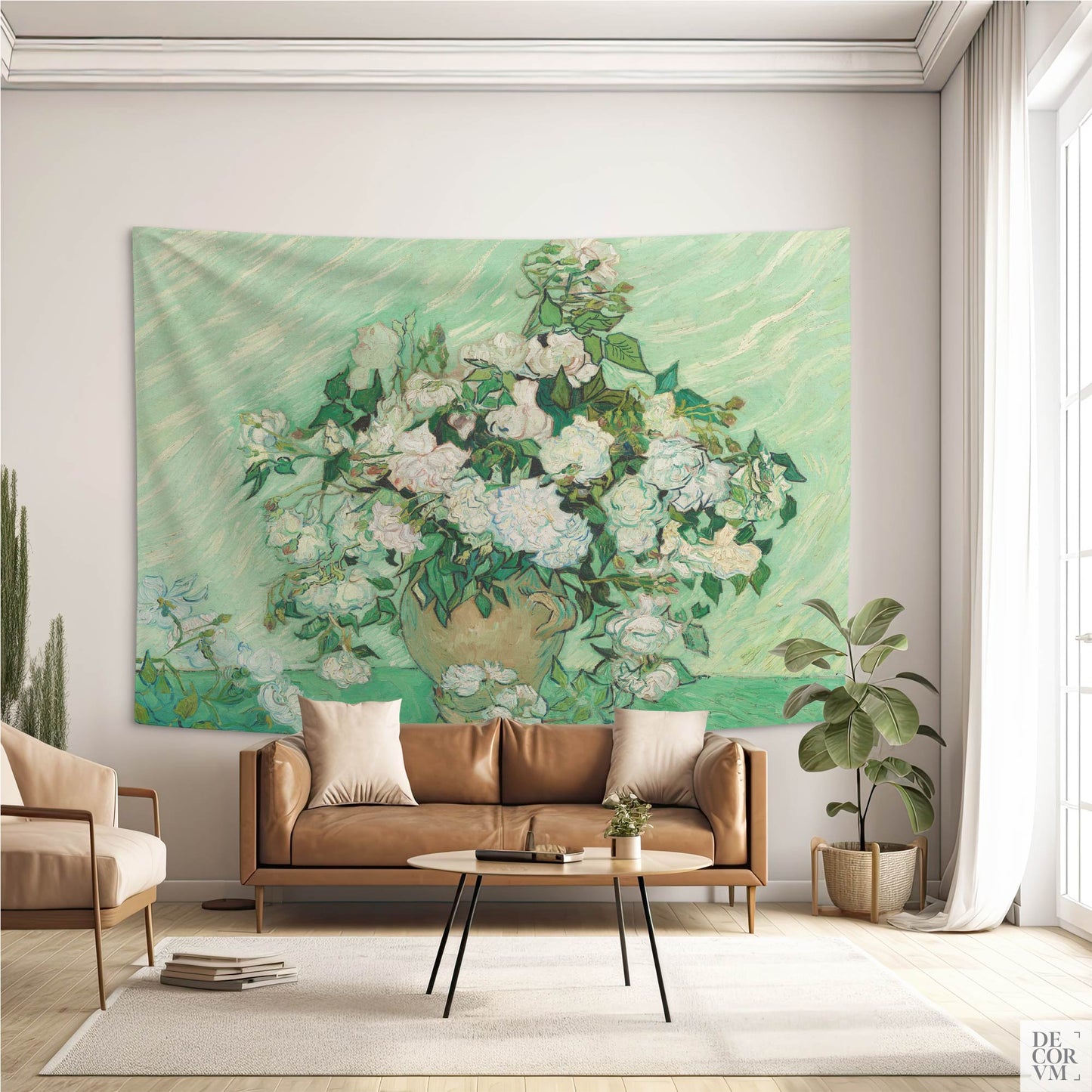 Large wall hanging with Van Gogh's “Roses” artwork above a tan leather sofa in a classic-styled living room.