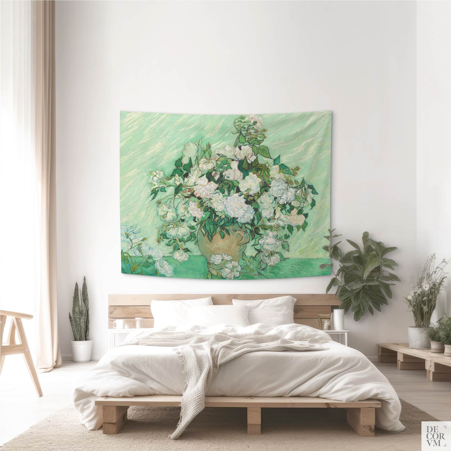 Medium-size Van Gogh roses tapestry used as wall decor above a low-profile wooden bed in a minimal boho bedroom.