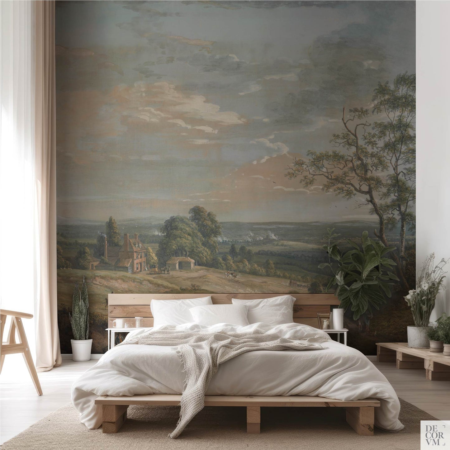 Cozy bedroom with large-scale countryside wall mural depicting a tree-lined horizon and rural scenery, by Decorvm.