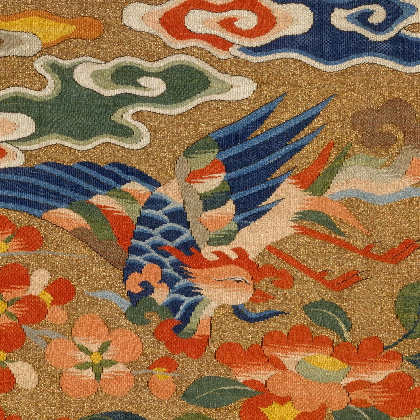 Phoenix wing in cobalt and coral with peony blooms and cloud scrolls on warm gold—Chinese rank badge pillow cover detail.