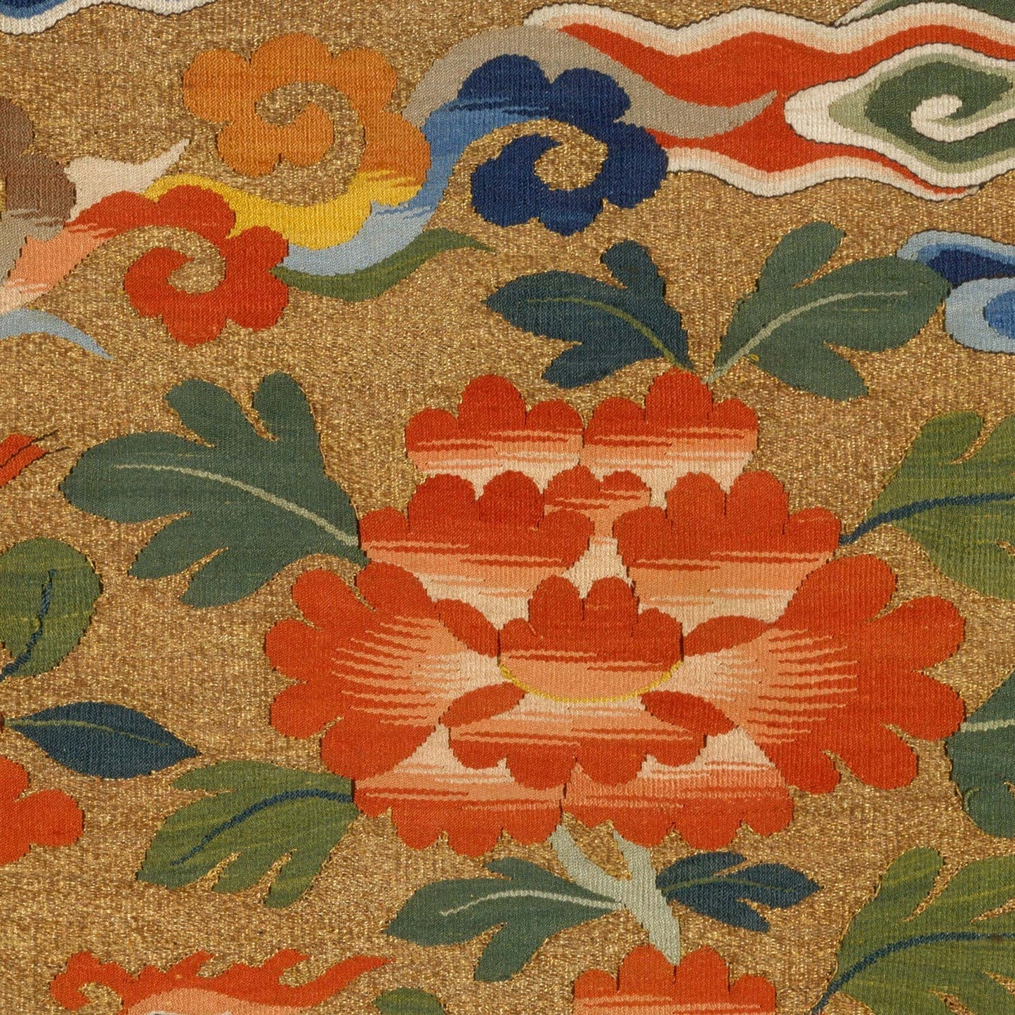 Layered peony rosette with jade leaves and swirling cloud bands on textured gold—detail from Chinese phoenix rank badge design.