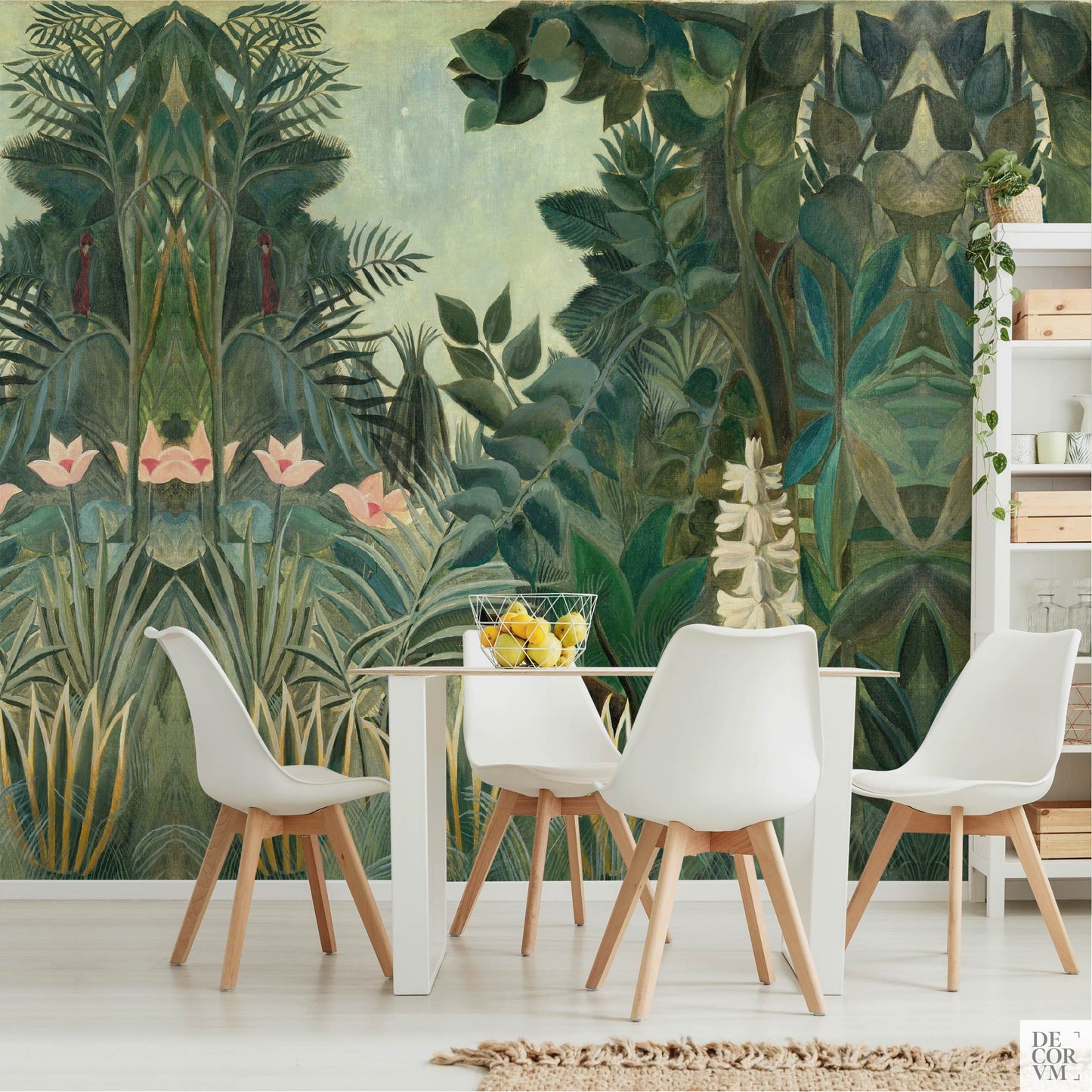 Dining space with modern white furniture set against a bold jungle wallpaper mural by Henri Rousseau.