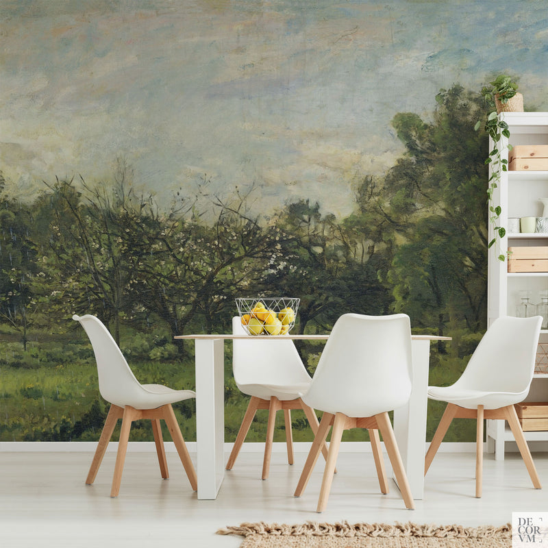 Spring orchard blossoms wallpaper mural covering the wall of a bright dining room behind a slim white table with white plastic chairs and a slender shelving unit by Decorvm.