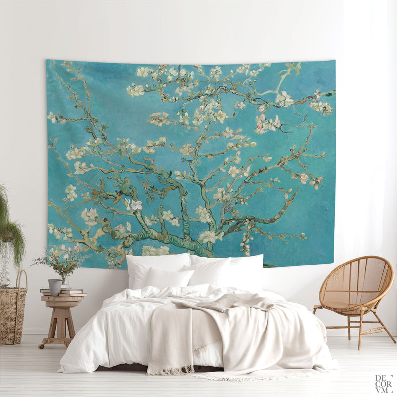 Bedroom with large Almond Blossom wall hanging fabric above the bed; turquoise floral van Gogh decor statement.