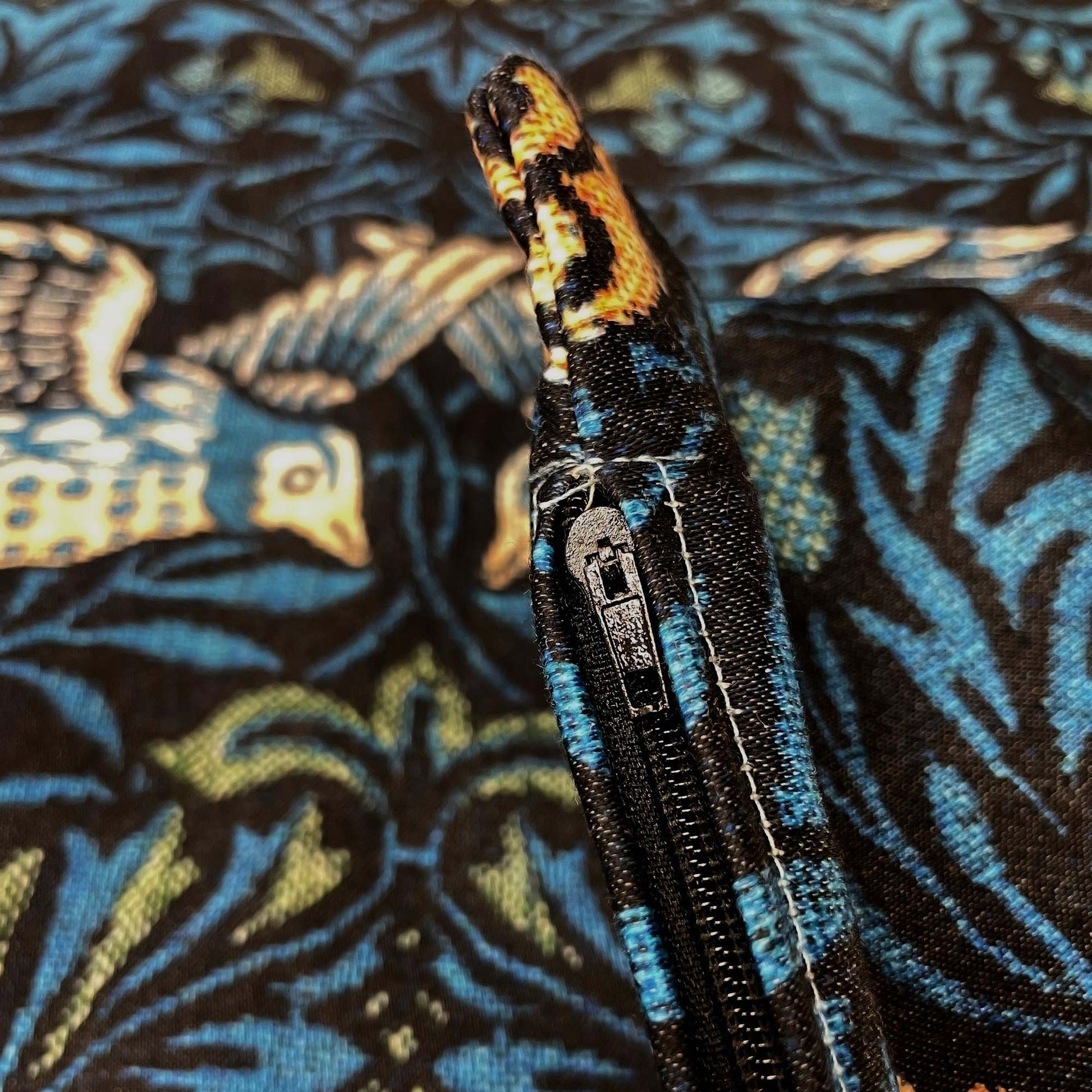 William Morris Blue Birds Throw Pillow Cover detail of the black zipper