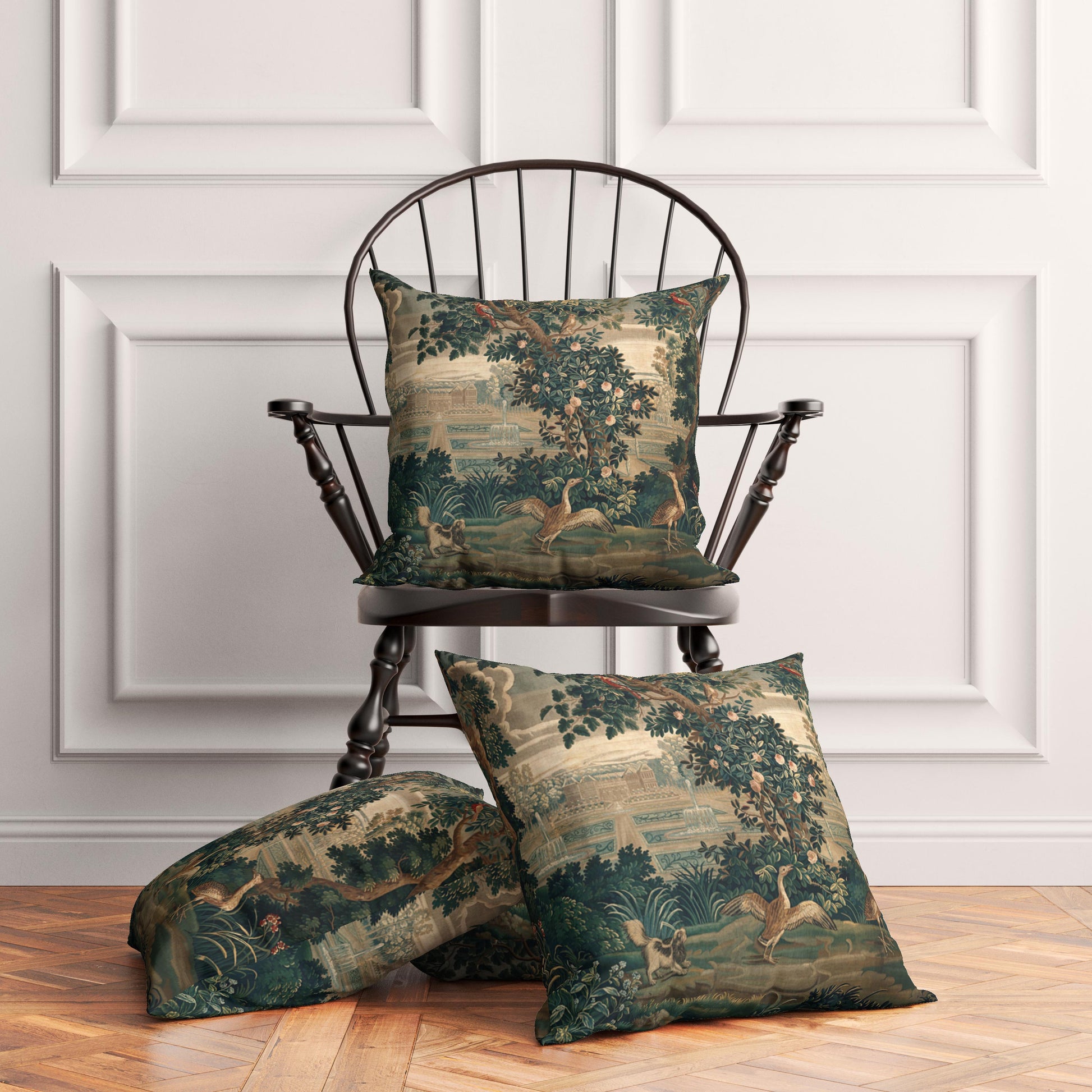 Verdure with Castle and Garden throw pillows on a vintage wooden chair and floor