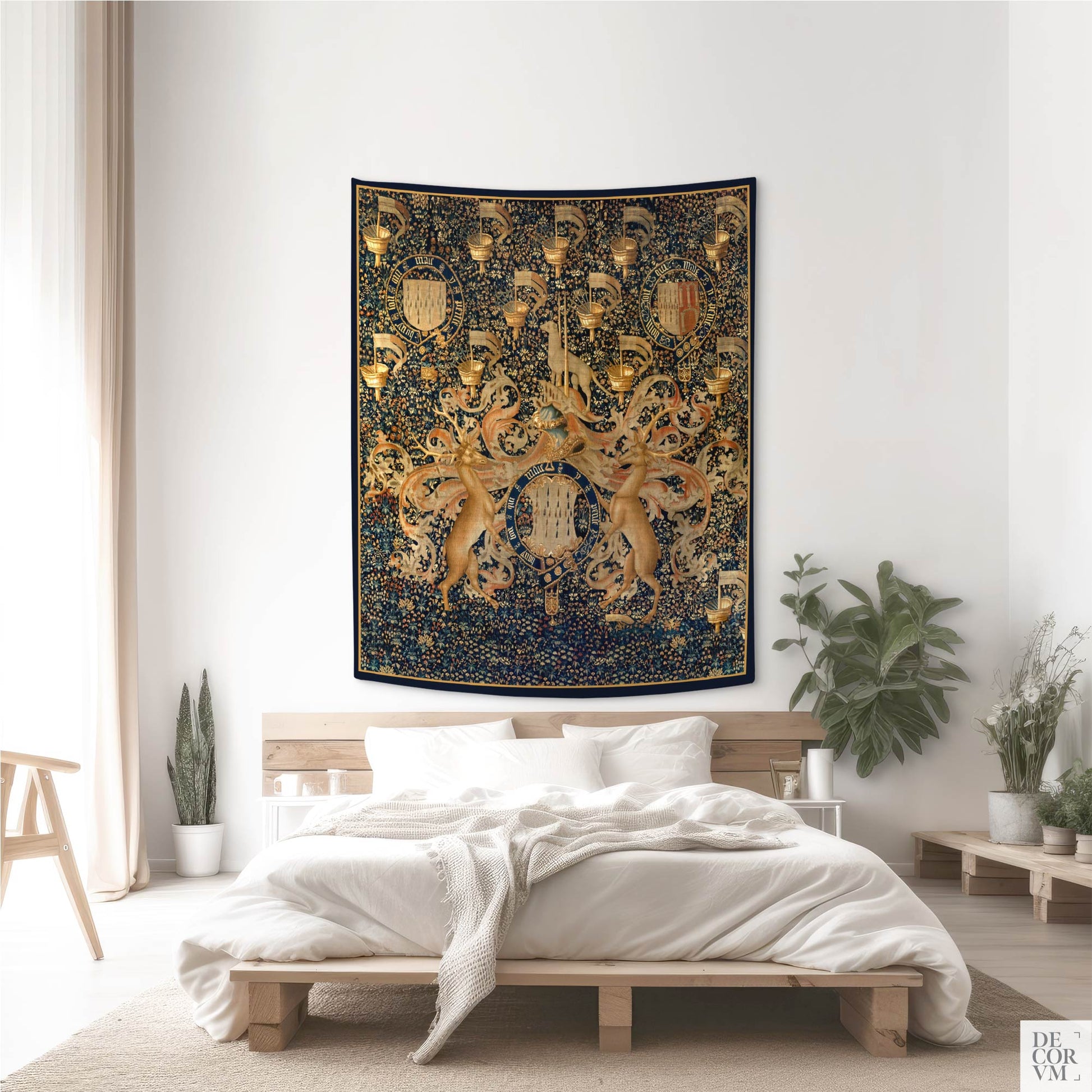 Medium-sized heraldic tapestry above a wooden bed, surrounded by indoor plants and natural textures.