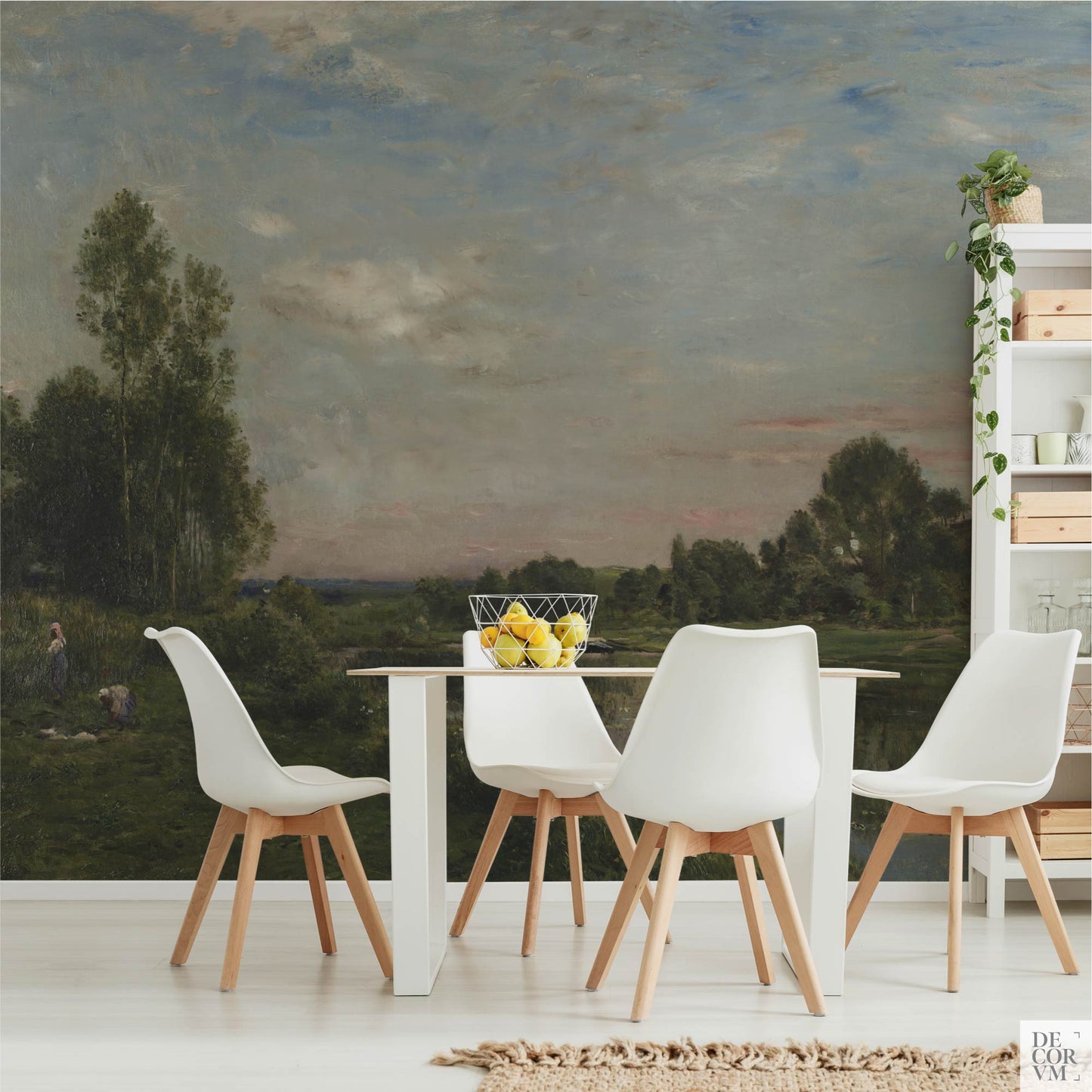 Dining area feature wall with the French River Landscape Wallpaper Mural—soft sky, green meadow, and river view behind a white table and modern chairs.
