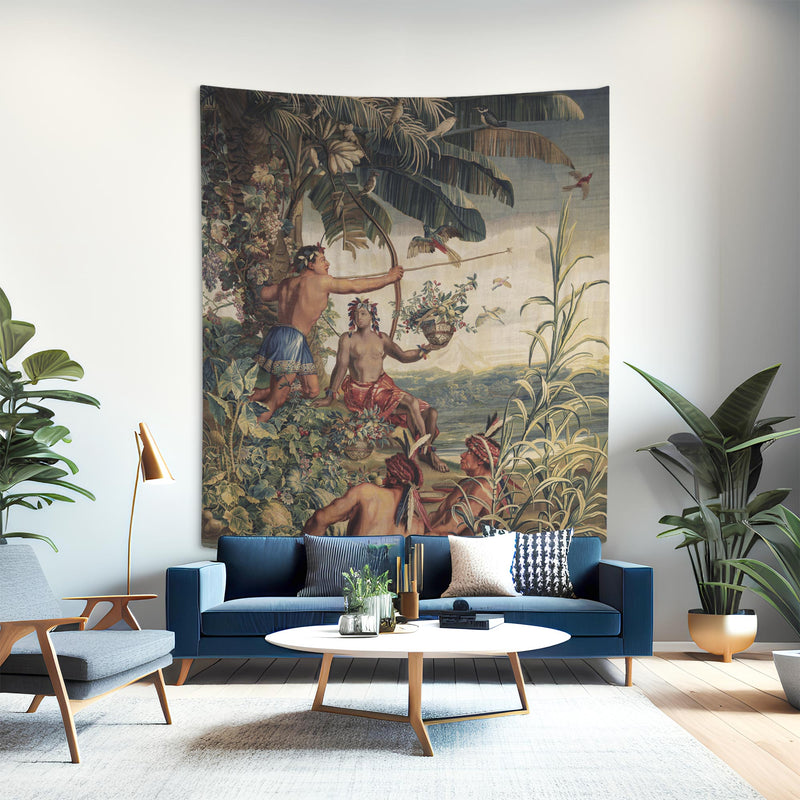 Large Gobelins Indian Hunter wall tapestry as a statement piece above a navy sofa in a modern living room — French Baroque tropical decor.