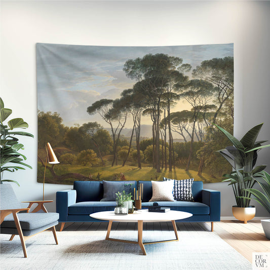 Umbrella pines Italian landscape tapestry on a white wall in a modern living room with blue sofa; large wall hanging.