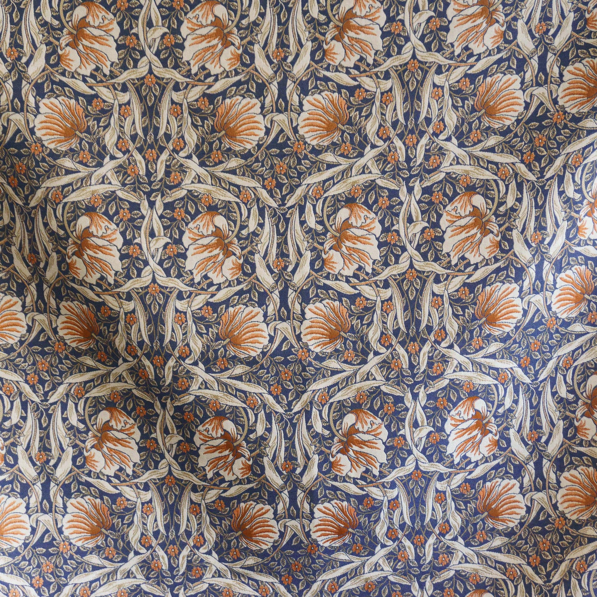 Full repeat of the Pimpernel pattern on woven jacquard; intertwining leaves and tulip-like blooms.