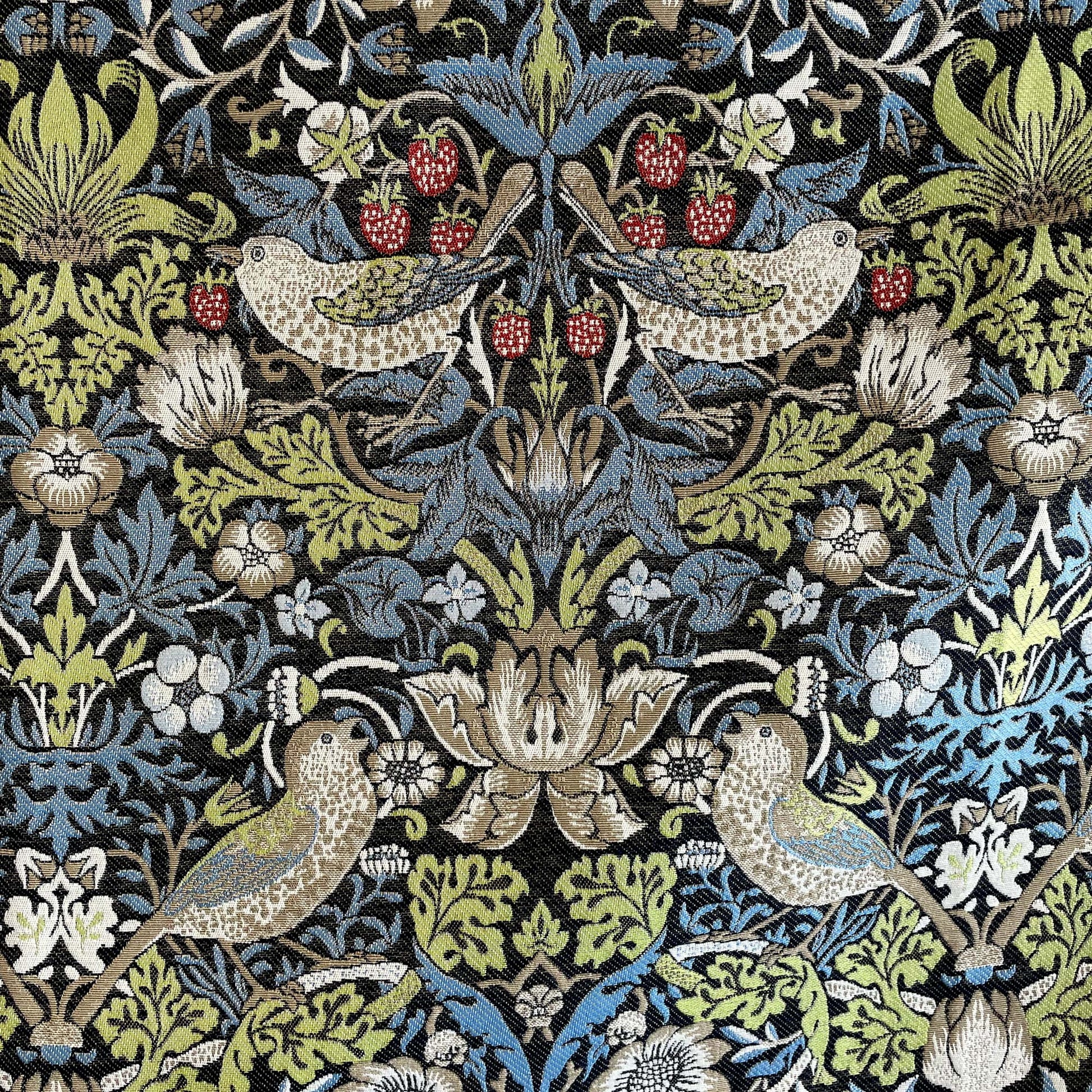 Close view of Strawberry Thief pattern with birds, berries, and foliage in William Morris style, blue sage and taupe palette.
