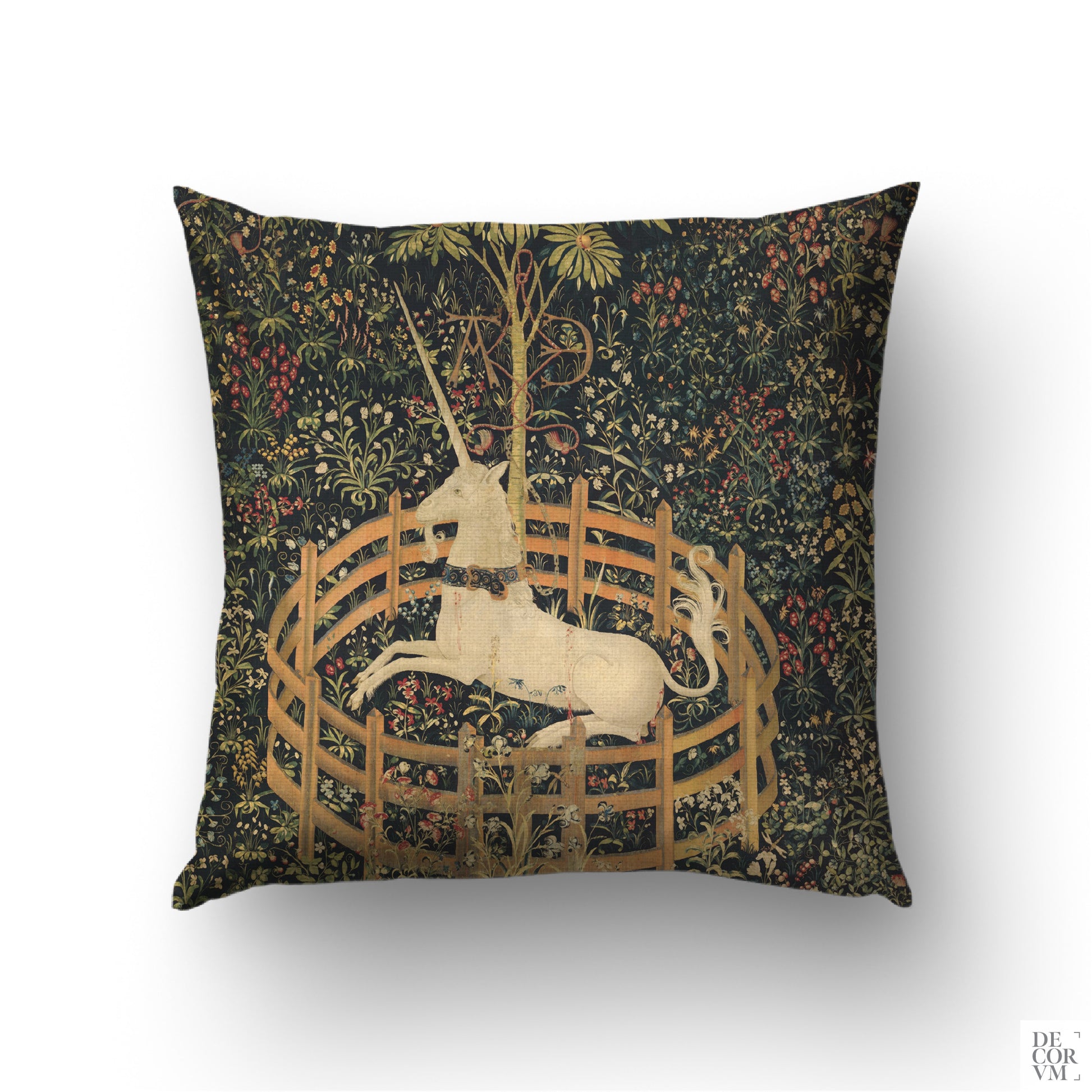 The Unicorn in Captivity cushion cover featuring a resting white unicorn surrounded by dark botanical millefleur — medieval dark academia decor.