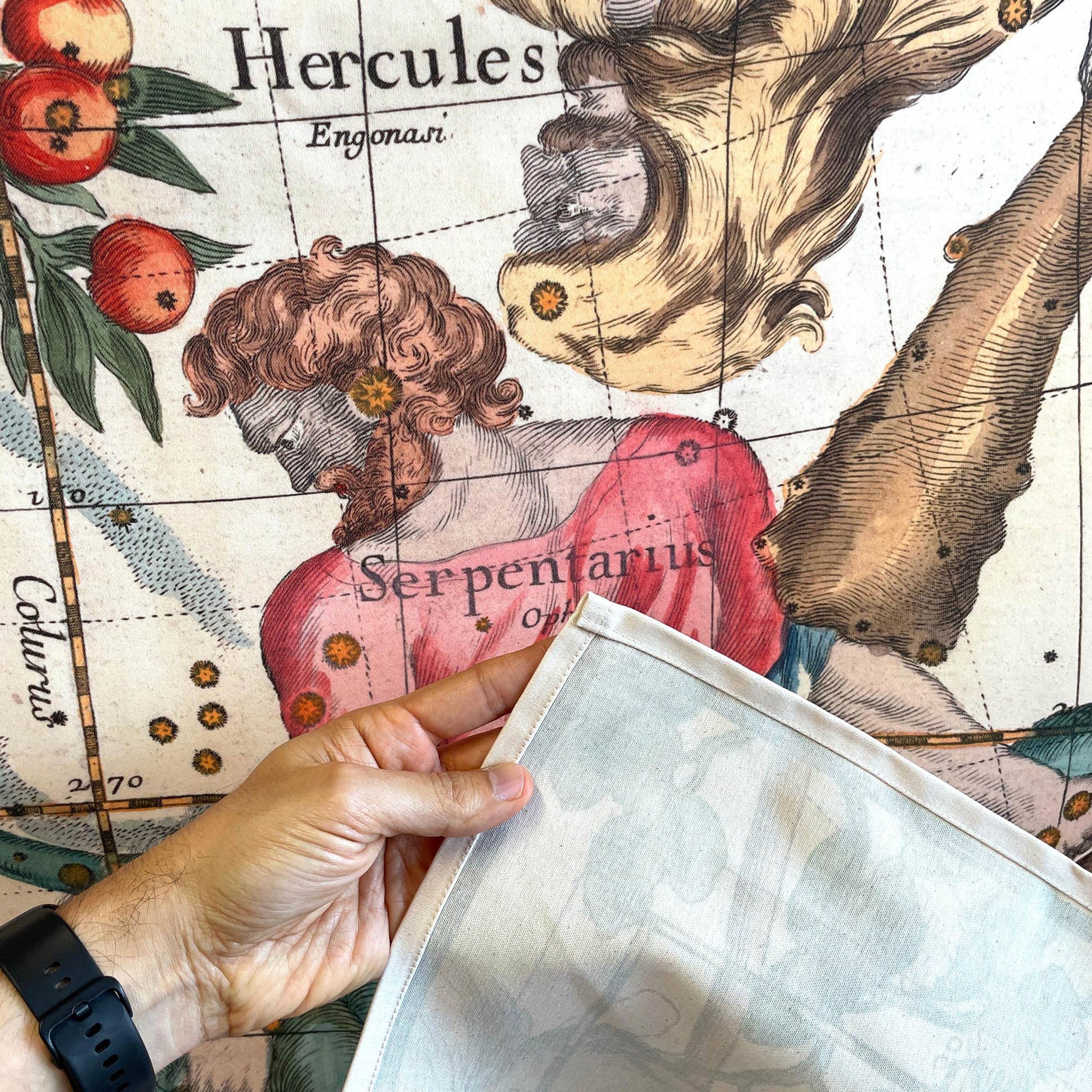 Hercules and Sagittarius constellation wall tapestry fabric edge detail showing cotton blend material and finished hem.