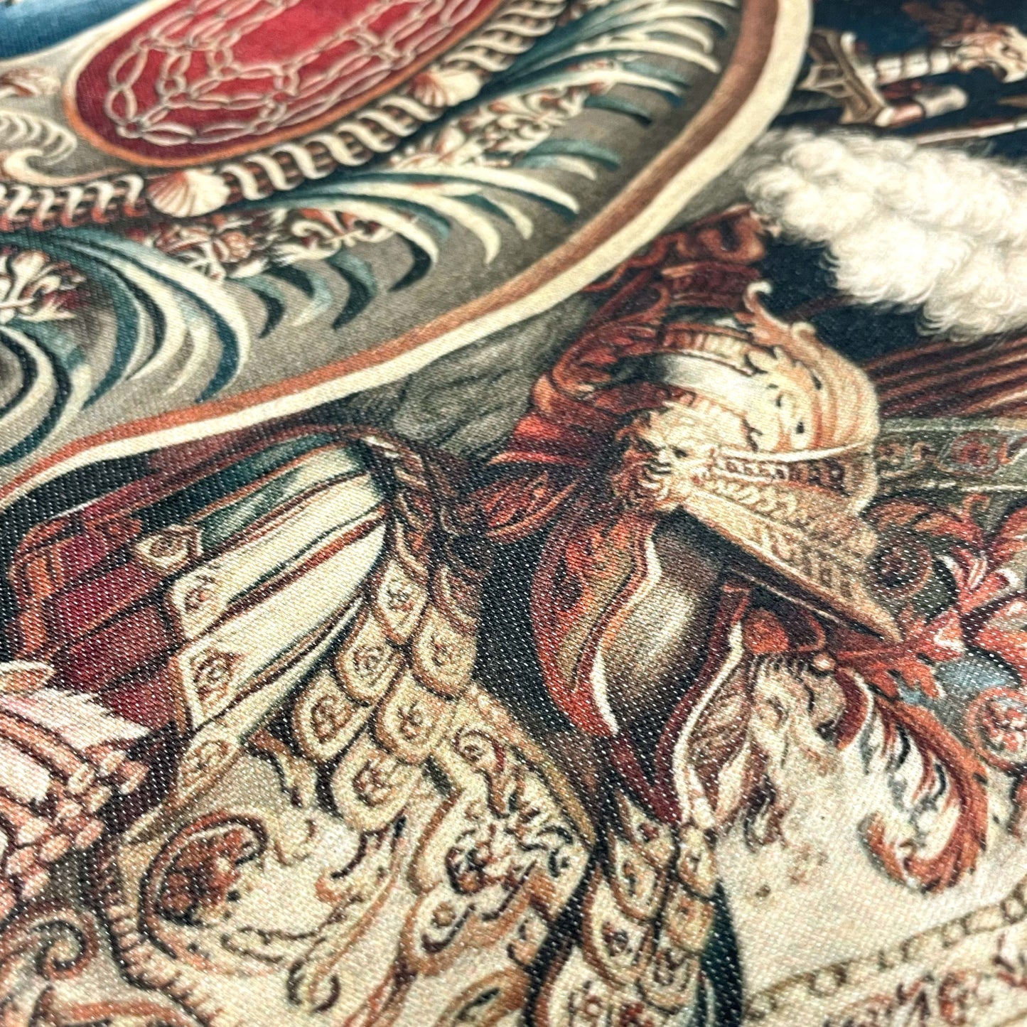 Detail of the historic military armor in rich blue, cream, and gold tones — design detail from Le Brun's Portière of the Chariot of Triumph.