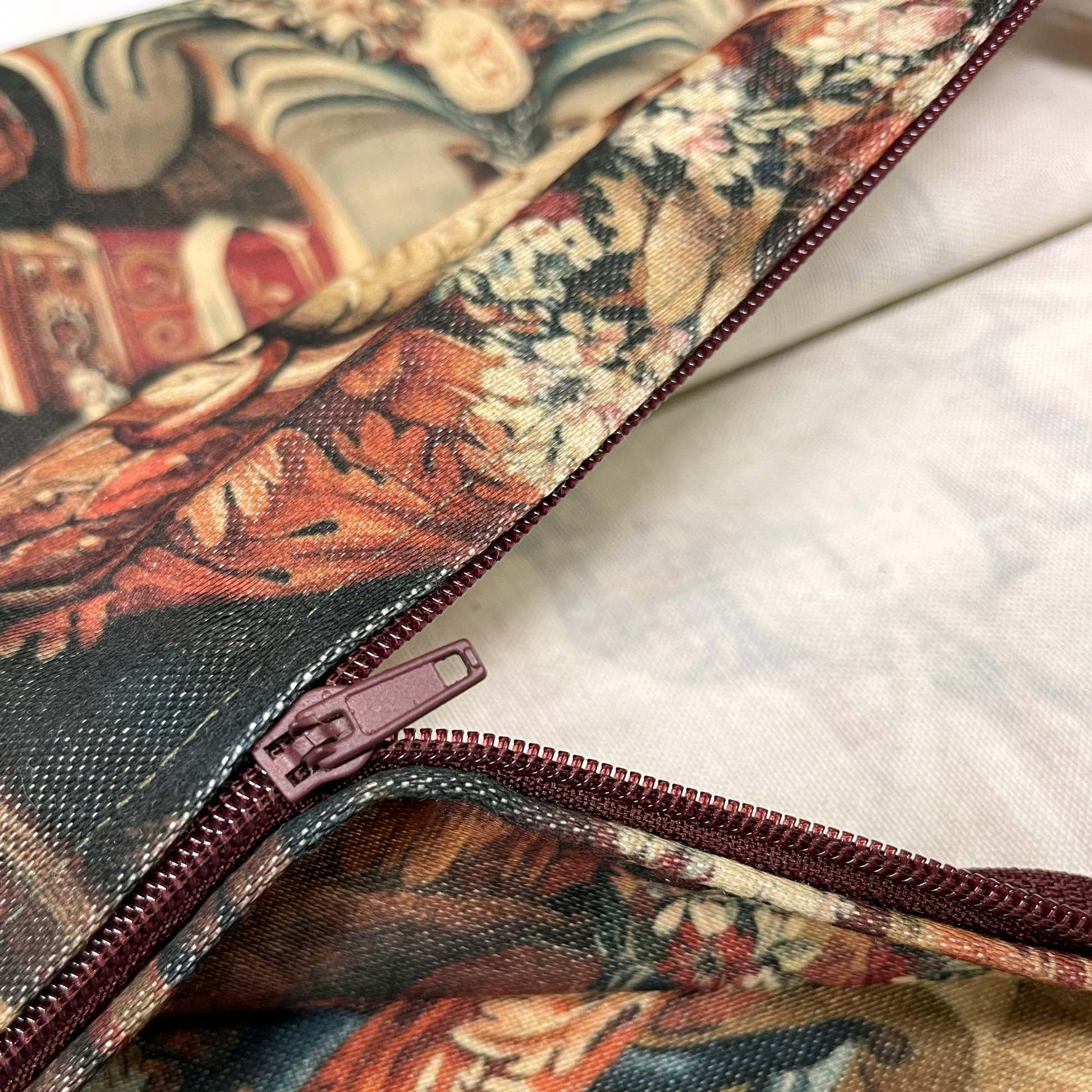 Open zipper and clean interior lining of the Portière of the Chariot of Triumph cushion cover — baroque French royal decor.