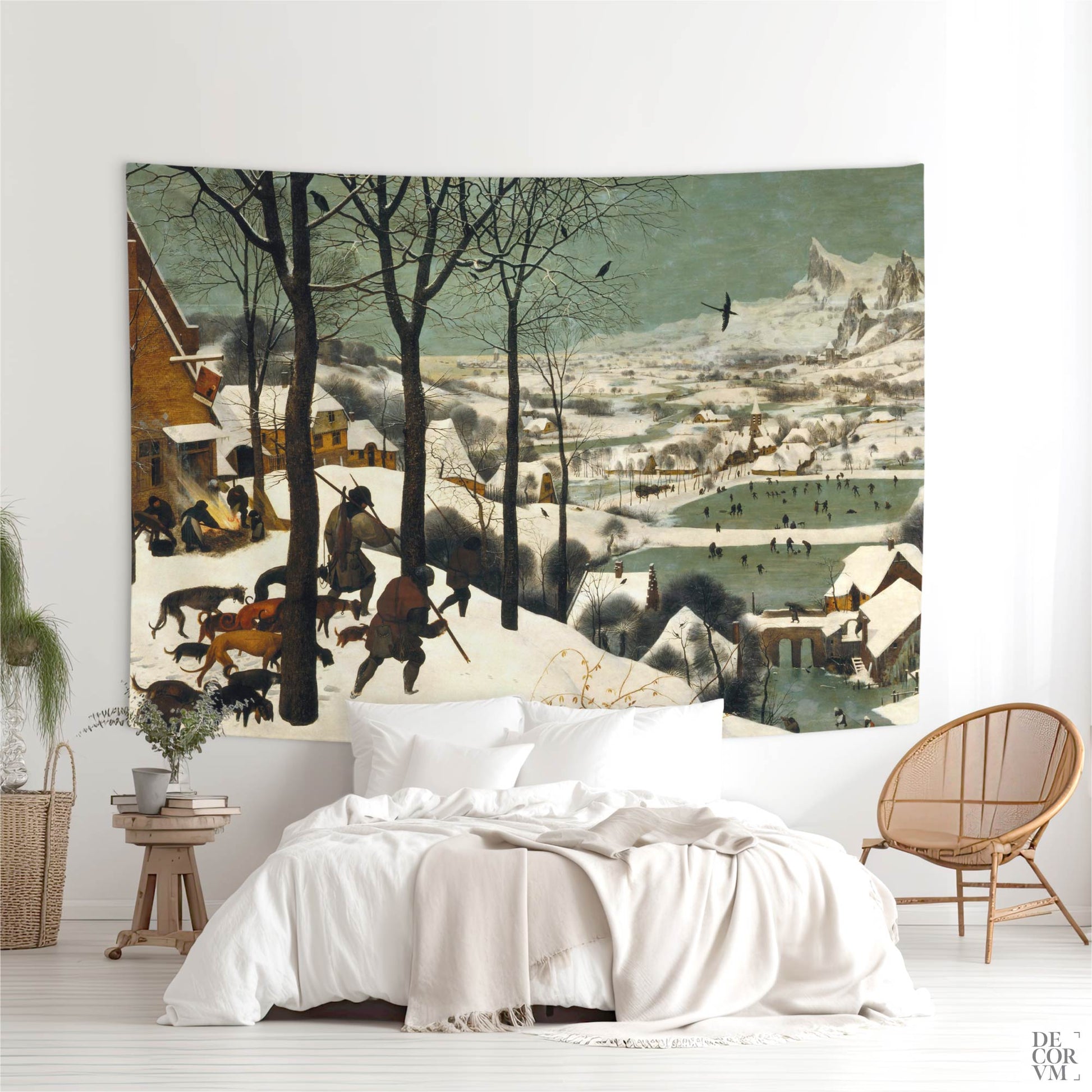 Bruegel "Hunters in the Snow" wall tapestry above white bed; winter village in sage and ivory for a cozy Nordic bedroom.