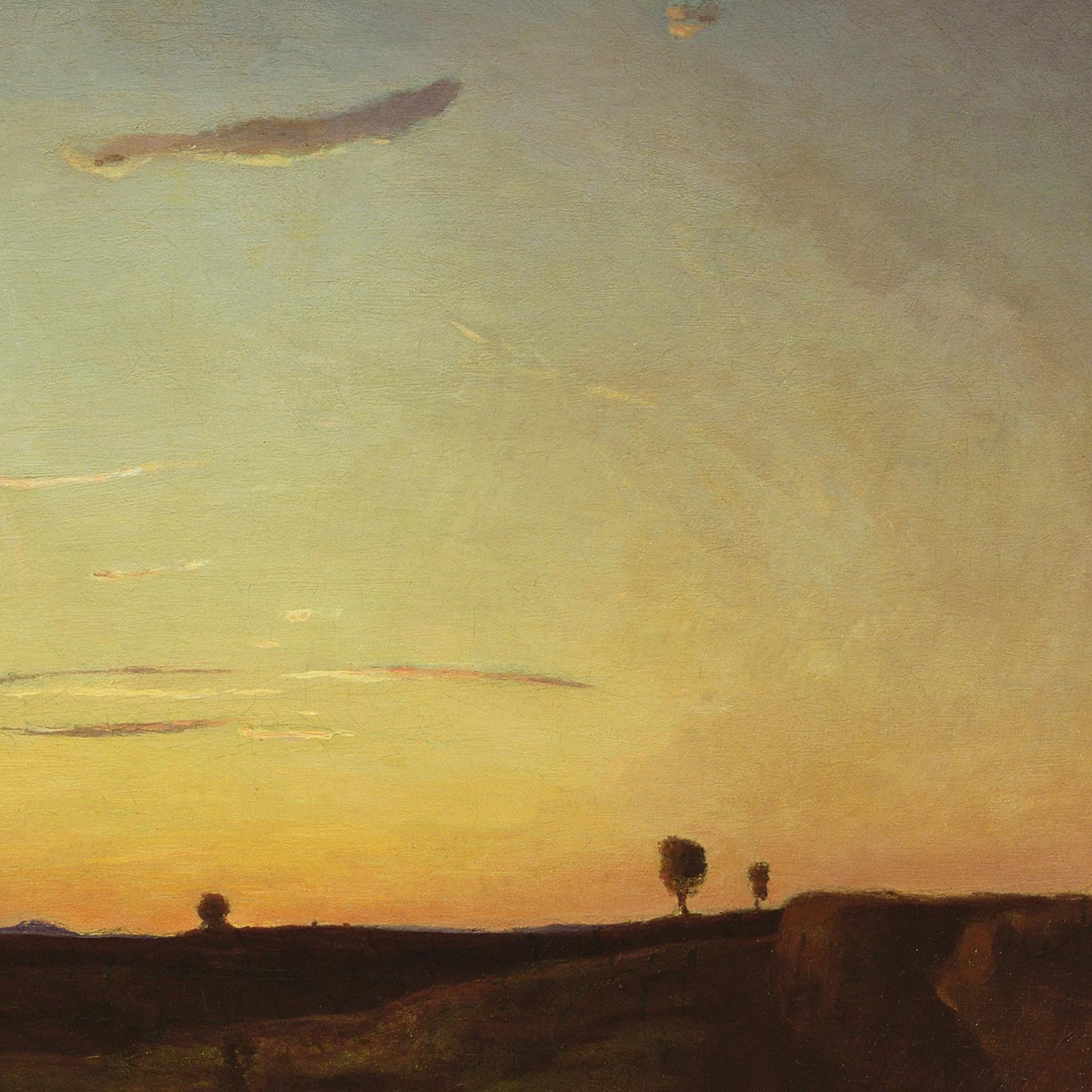 Detail of twilight sky — golden-orange sunset transitioning to blue-green with wispy pink-tinted clouds above dark horizon