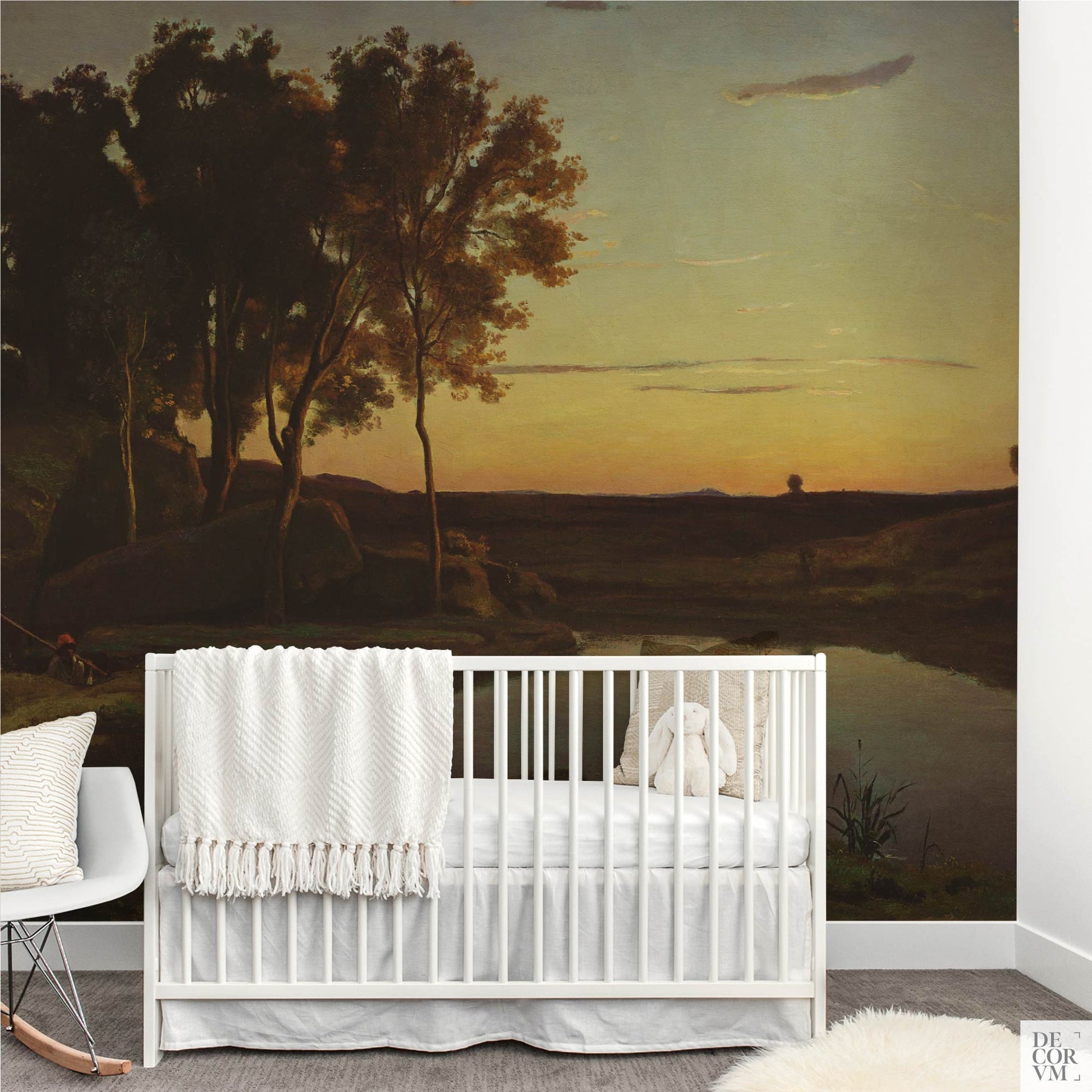 Corot twilight lake wallpaper mural in a nursery with white crib, stuffed bunny, and rocking chair