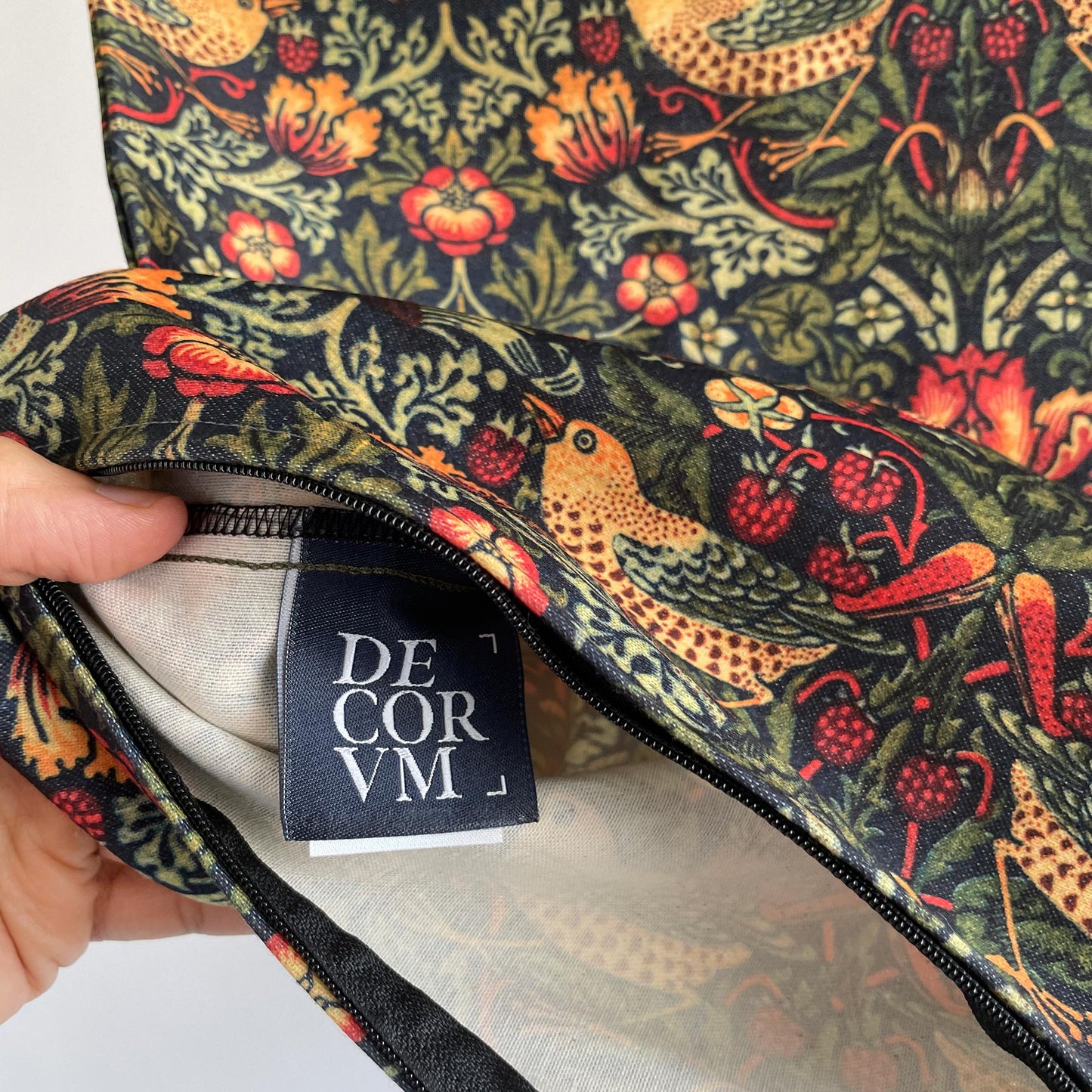 Decorvm brand tag inside the William Morris Strawberry Thief pillow cover.