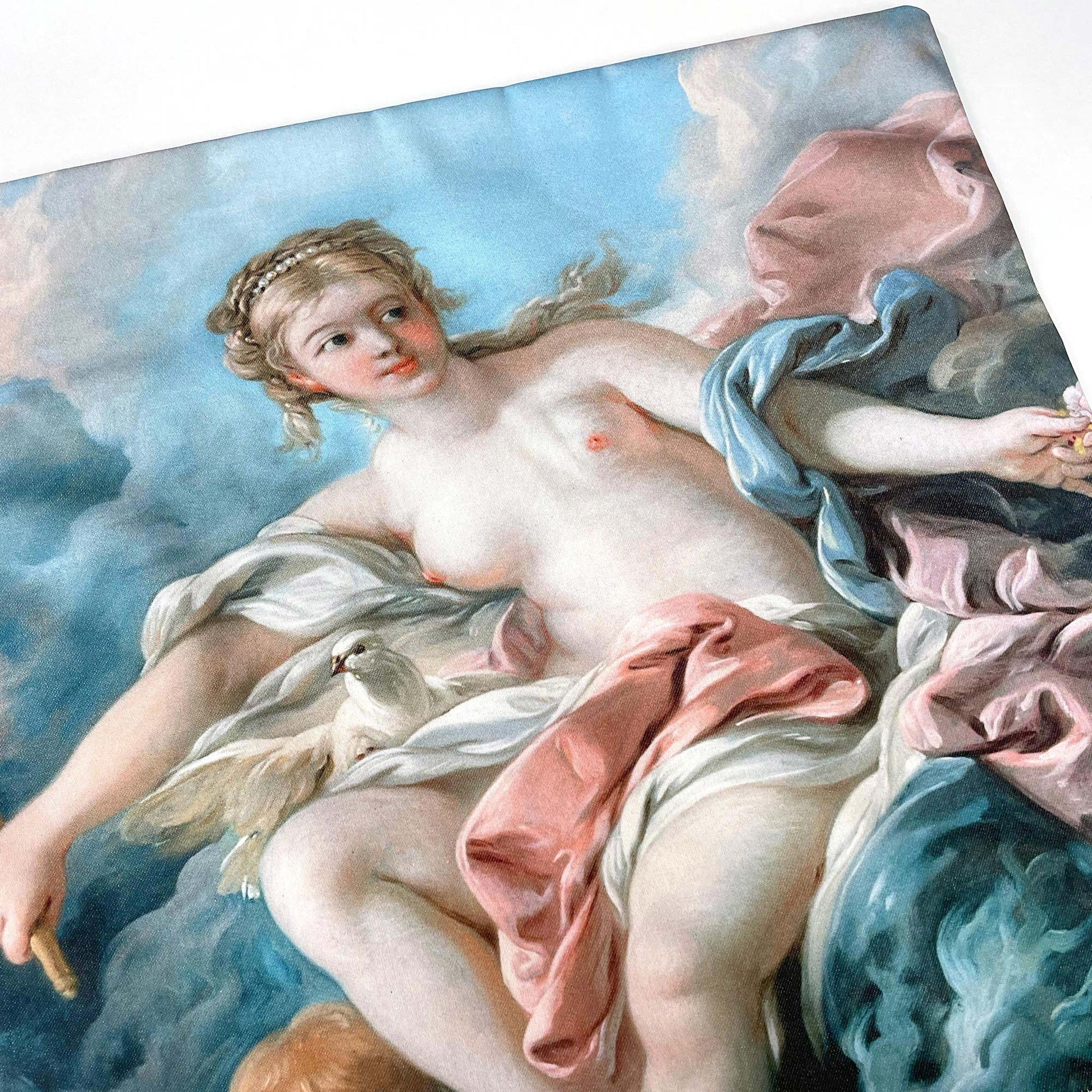 Close-up of the Venus throw pillow cover showing Venus surrounded by flowing pastel drapery and a white dove.
