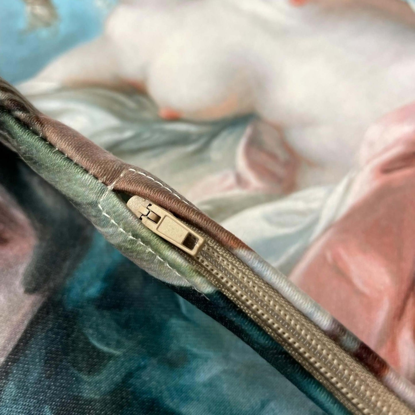 Hidden beige zipper sewn into the side seam of the French Rococo Venus pillow cover.