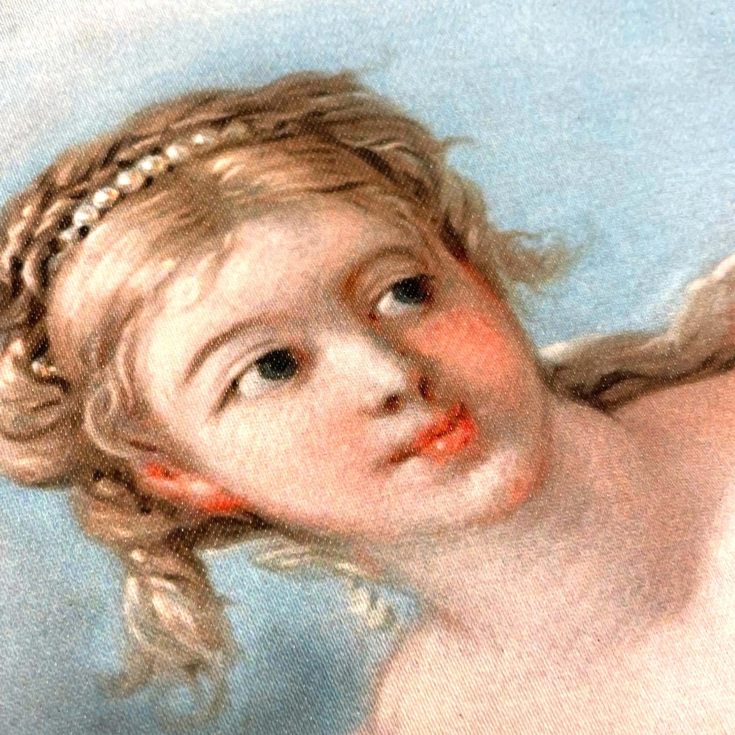Close-up of Venus's face in pastel tones — painting detail from Boucher's Venus composition.