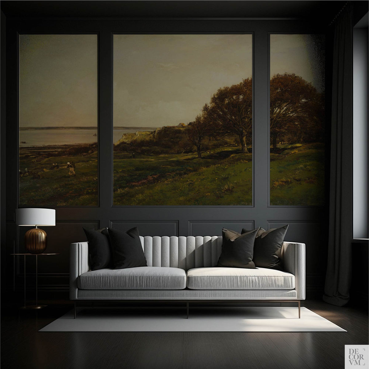 French seaside landscape wallpaper mural displayed as three dark-framed panels in an elegant living room with gray tufted sofa and brass lamp