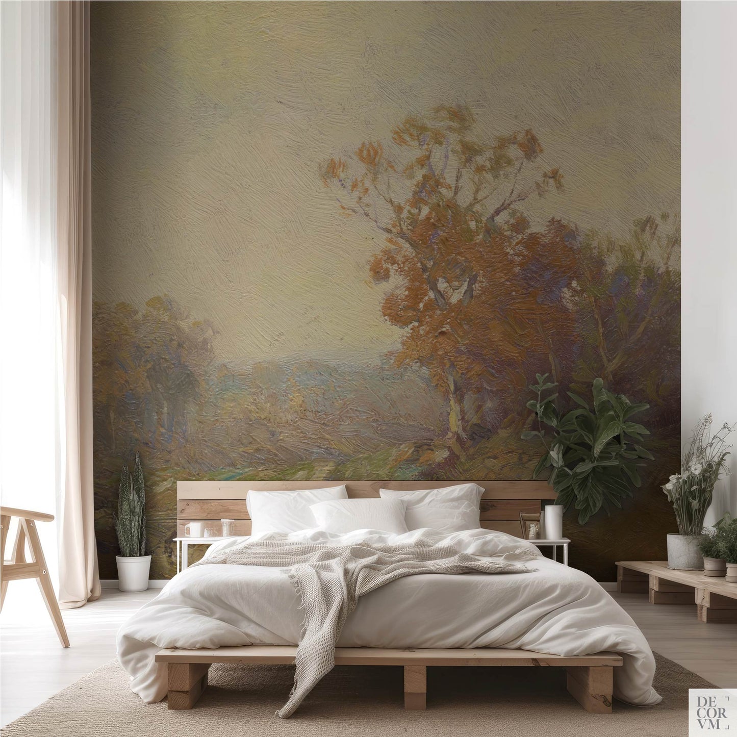 Golden autumn landscape wallpaper mural as accent wall in a minimalist bedroom with wooden platform bed and white bedding
