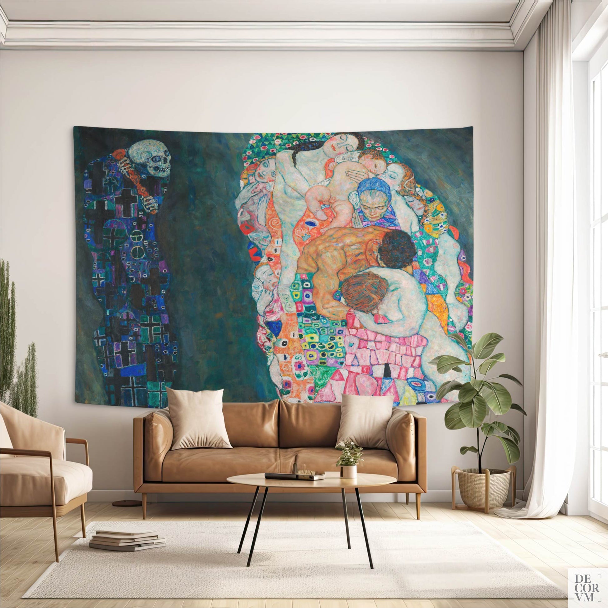 Klimt Death and Life wall tapestry styled in a contemporary minimalist living room above a tan leather sofa — symbolist art nouveau decor.