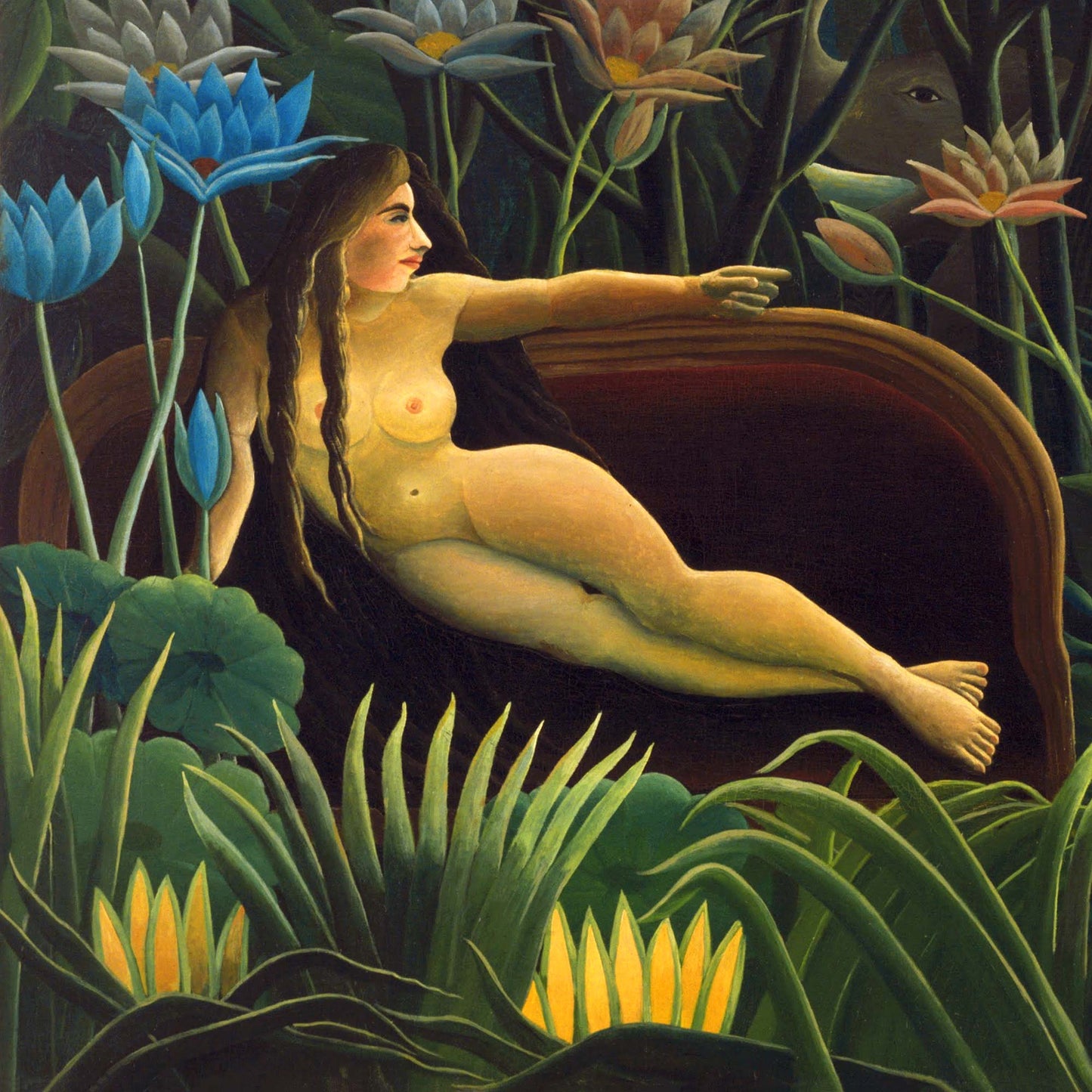 Close-up detail of a reclining nude figure with long braided hair on a red velvet chaise, surrounded by blue lotus flowers and dense jungle foliage — from Henri Rousseau's 1910 painting The Dream.