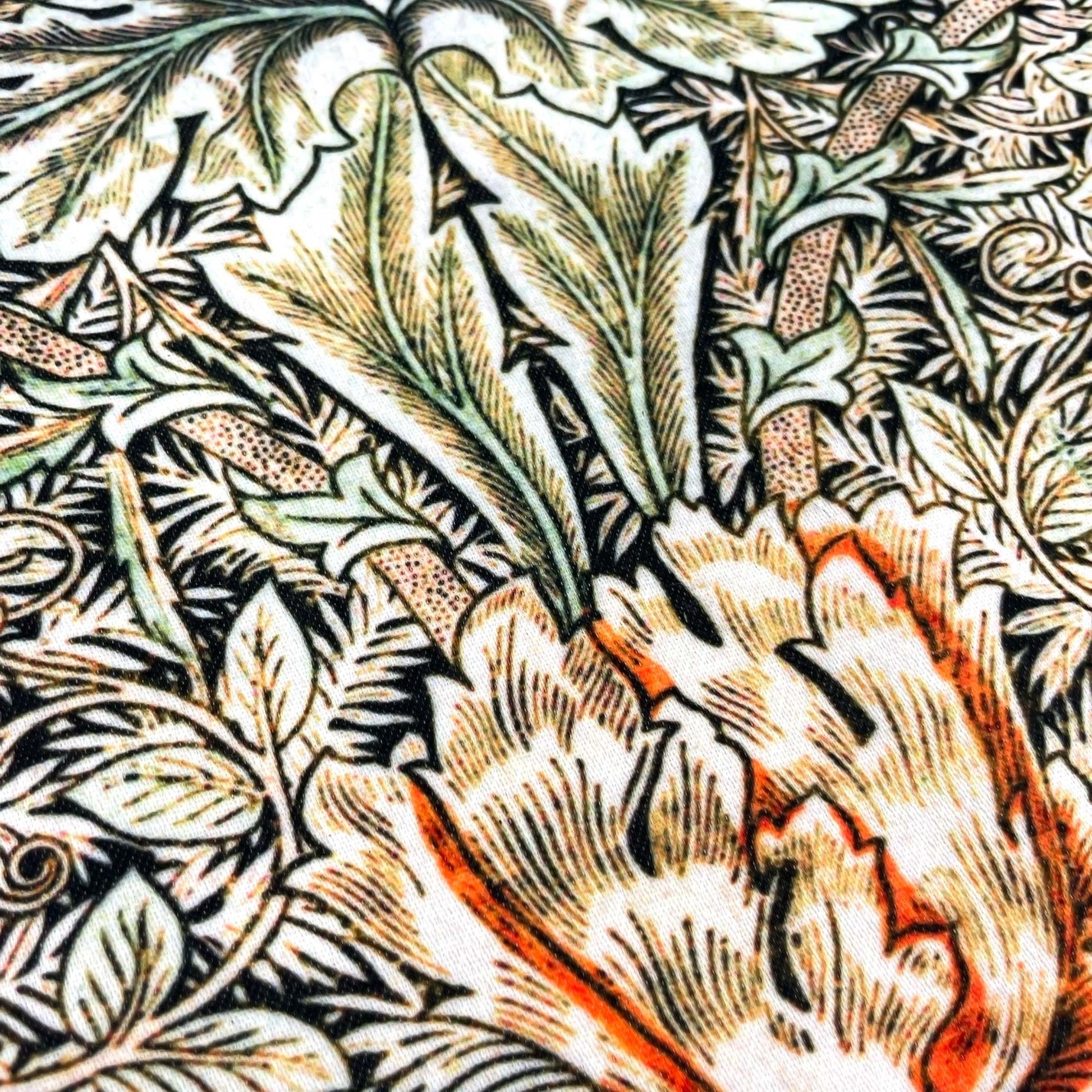Close-up of orange blooms and green foliage — design detail from May Morris's 1883 Honeysuckle pattern.