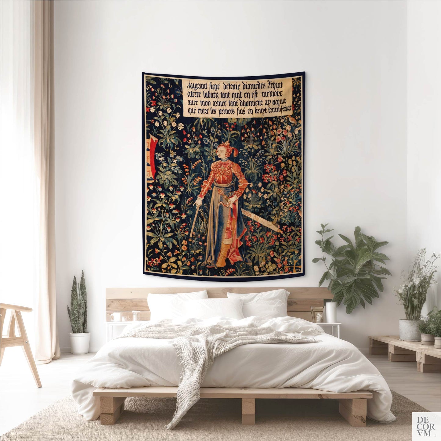 Medium Medieval Amazon Queen Penthesilea wall tapestry above a platform bed in a light minimalist bedroom by Decorvm.