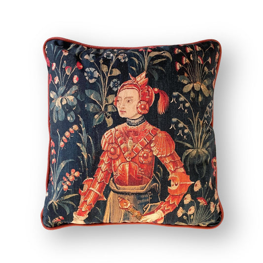 Medieval Amazon Queen Penthesilea cushion cover with red piping — warrior in red armor against dark millefleurs background, dark academia decor.