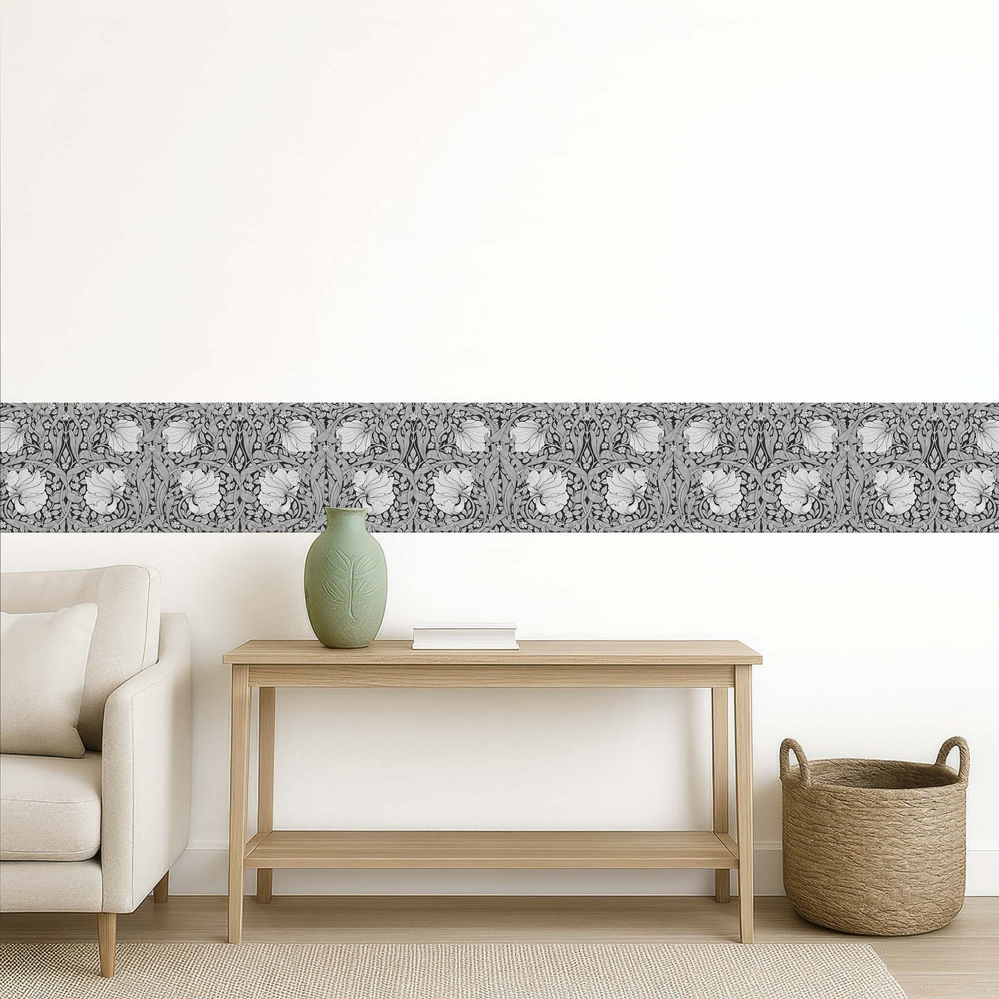 William Morris Pimpernel peel and stick wall border in grayscale — transitional living space with woven basket, green vase, and monochrome floral trim