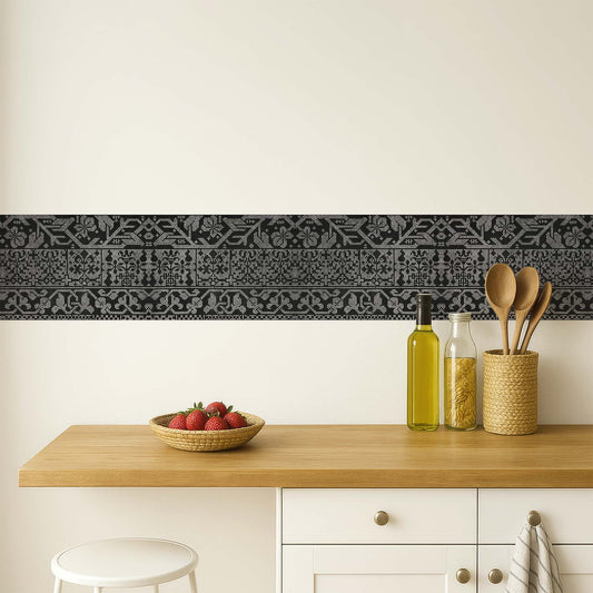Renaissance geometric peel and stick wall border in black — kitchen styling above a wood countertop with utensils and fruit bowl by Decorvm