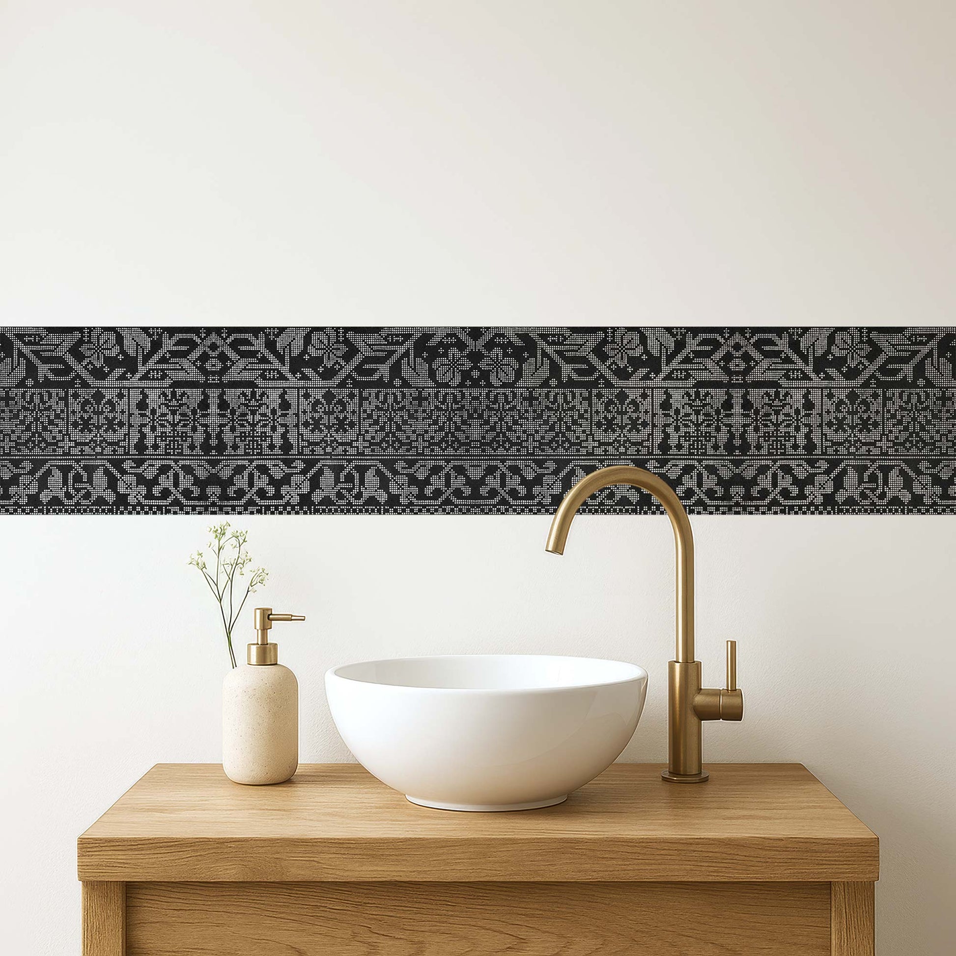 Renaissance geometric peel and stick wall border in black — above a bathroom vanity with brass faucet and white vessel sink