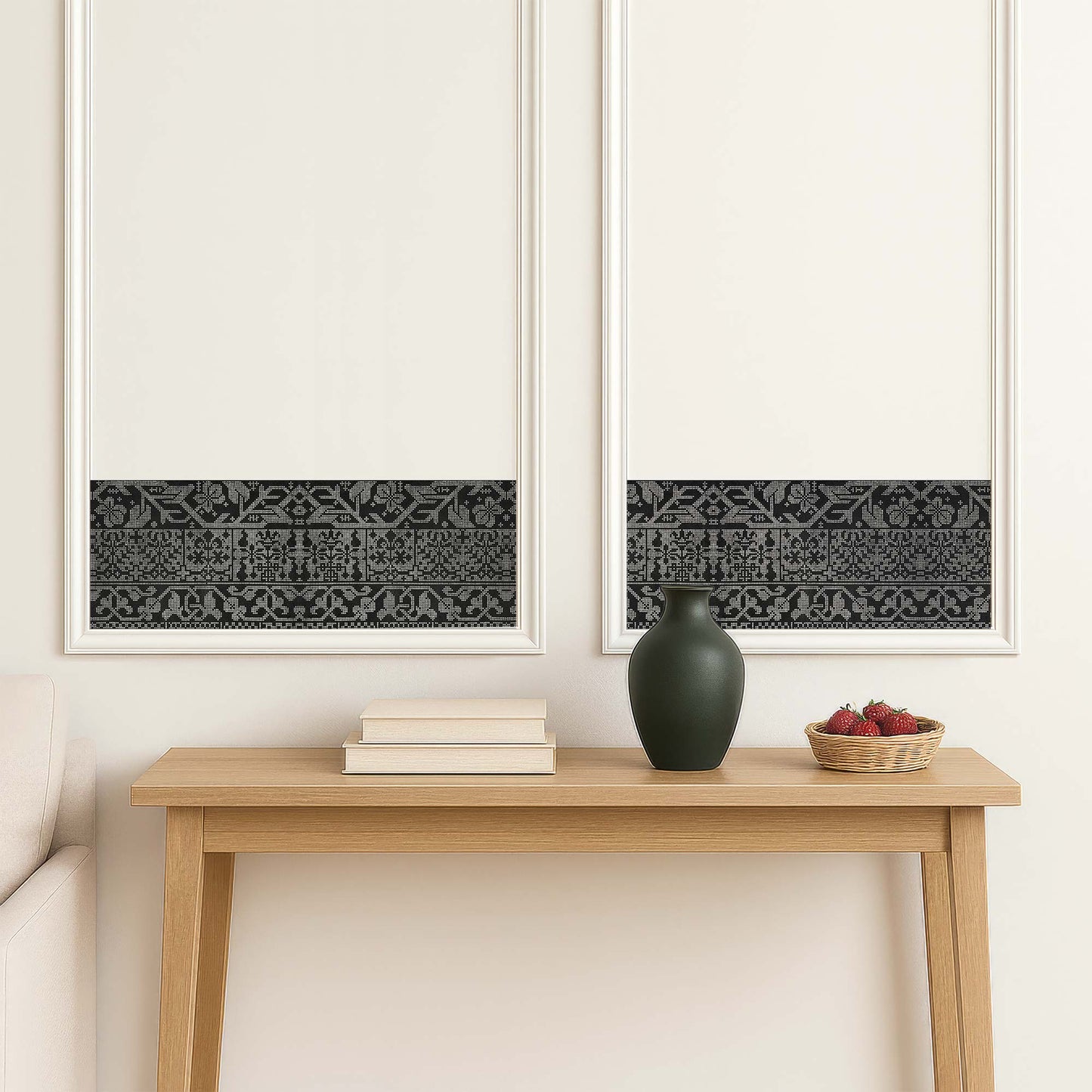Renaissance geometric peel and stick wall border in black — installed inside classic white wall moulding panels above a console table
