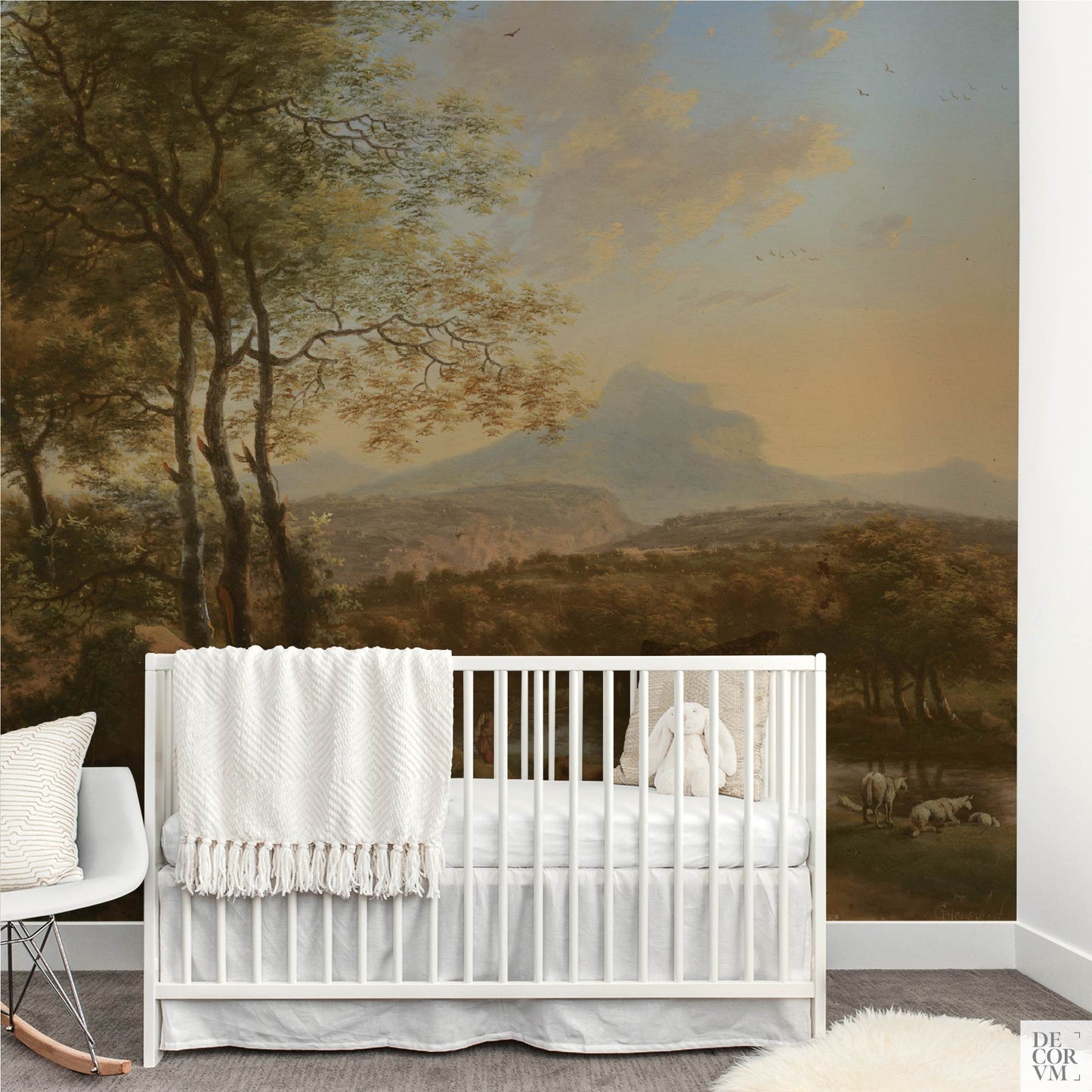 Italian river landscape wallpaper mural in a gender-neutral nursery — peaceful historic nature scene behind a white crib for a baby room