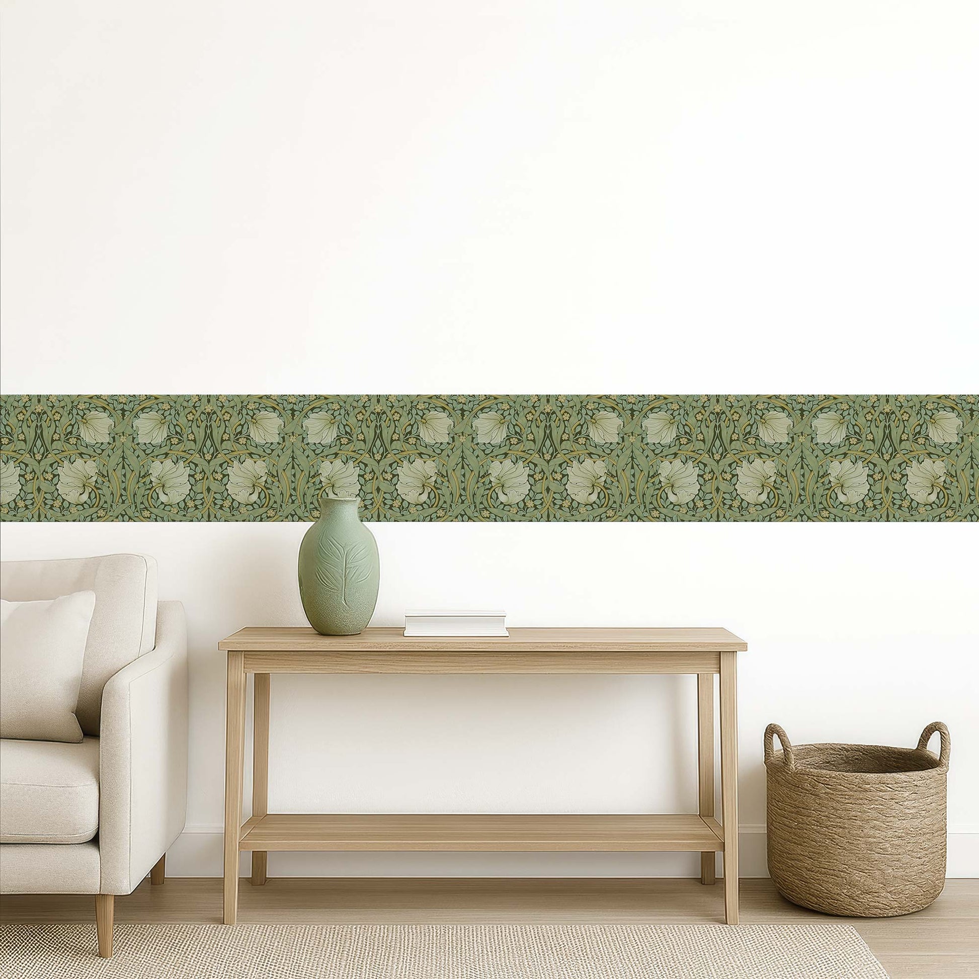 William Morris Pimpernel peel and stick wall border in sage — seamless installation on a white wall above a wooden console table in an entryway