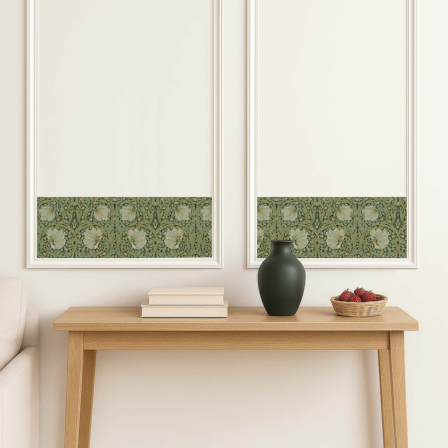 William Morris Pimpernel peel and stick wall border in sage — installed inside white wall moulding panels for a custom wainscoting effect