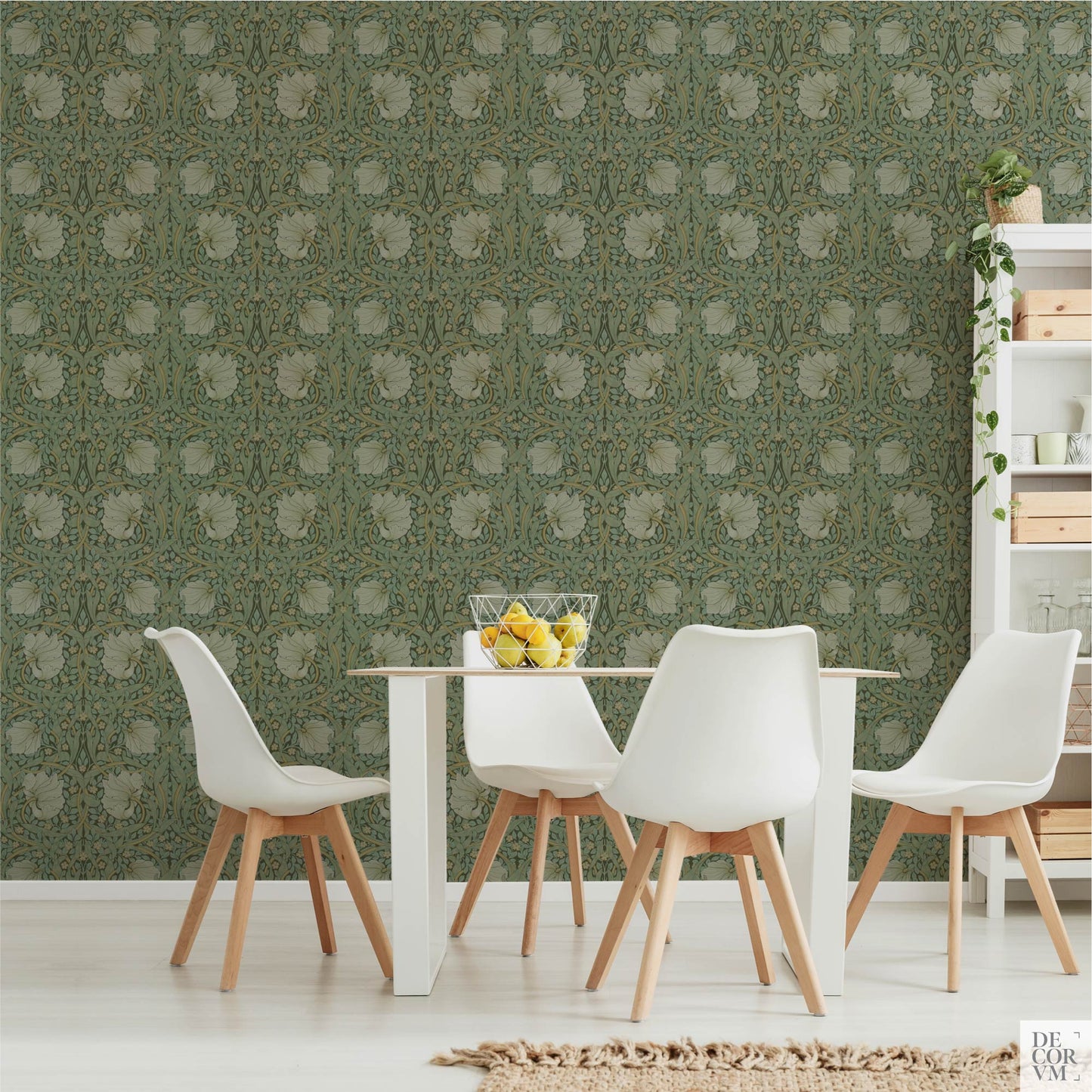 Dining room scene showcasing the William Morris Pimpernel Wallpaper Mural — Sage Arts & Crafts Decor behind a white table and chairs, alongside a white open shelving unit holding plants and crates.