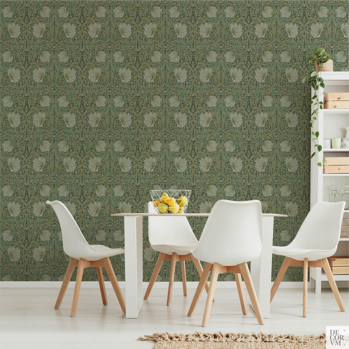 Dining room scene showcasing the William Morris Pimpernel Wallpaper Mural — Sage Arts & Crafts Decor behind a white table and chairs, alongside a white open shelving unit holding plants and crates.