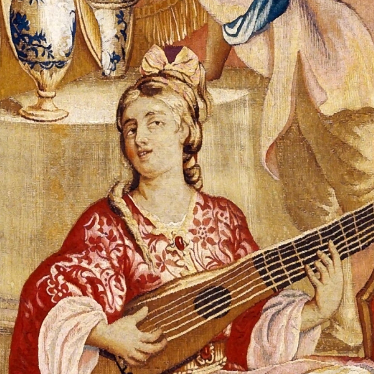 Close-up of a female musician playing a stringed instrument, highlighting the intricate 17th-century red garments and fine woven details in our traditional Chinoiserie wall tapestry.